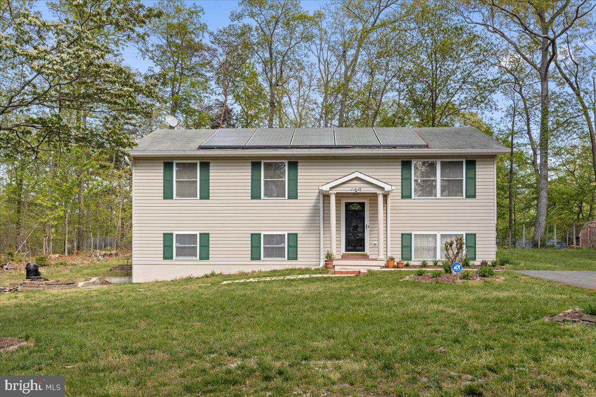Welcome to 11448 Stirrup Lane, a charming 3-bedroom, 3-bathroom home nestled on a quiet street in the desirable Chesapeake Ranch Estates community. With a flat yard and a brand-new deck, this home is perfect for outdoor enjoyment and entertaining. Step inside to discover an inviting open-concept layout, where natural light fills the space. The modern kitchen features stainless steel appliances and granite counter tops seamlessly flowing into the dining and living areas—ideal for both everyday living and hosting guests. The partially finished basement provides even more living space, boasting a large rec room and an additional full bath, the other half offering endless possibilities for a home office, gym, or guest suite. Outside, the flat yard provides plenty of space for play, gardening, or relaxing, while the brand-new deck is the perfect spot for summer barbecues. Located in Chesapeake Ranch Estates, this home offers access to private beaches, a lake, hiking trails, and more, making it a wonderful retreat for those who love both comfort and nature. Don't miss out on this move-in-ready gem—schedule your showing today!