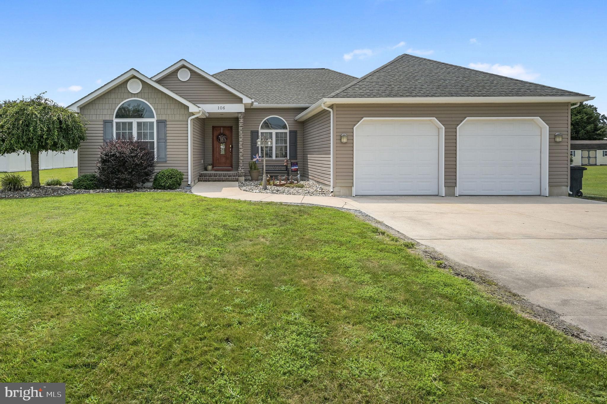 Discover the perfect blend of comfort and functionality in this well-designed ranch home, complete with a versatile pole barn and NO HOA! The heart of the home showcases a beautiful kitchen with quartz countertops, tile backsplash, and a two-level island with seating, flowing seamlessly into the dining area and living room. Step from the living space onto the deck, perfect for relaxing or entertaining. The split-bedroom floorplan offers privacy, featuring a spacious primary suite with a stall shower, jetted tub, double-sink vanity, water closet, and a walk-in closet. Two well-sized secondary bedrooms share a full hall bathroom with a tub shower, linen closet and single vanity. There are also two closets in the hallway for linen and coat storage. Additional features include ductless HVAC throughout, recessed lighting, and luxury vinyl plank flooring in main living areas with carpet in bedrooms. A thoughtfully placed laundry room sits just off the kitchen and garage, offering a huge pantry and the ability to close it off from the main house. The 2-car garage, with separate doors, an exterior side entry, and painted interior, adds convenience, while the pole barn expands your storage or workspace options. Located in the heart of Delaware, this home offers the best of both worlds - just 35 minutes from the ocean beaches and only minutes from the bay. Enjoy easy access to coastal living without the congestion, plus quick trips to Milford, Camden, and Harrington for a variety of shopping and dining options. Schedule a tour to see this fantastic home for yourself!