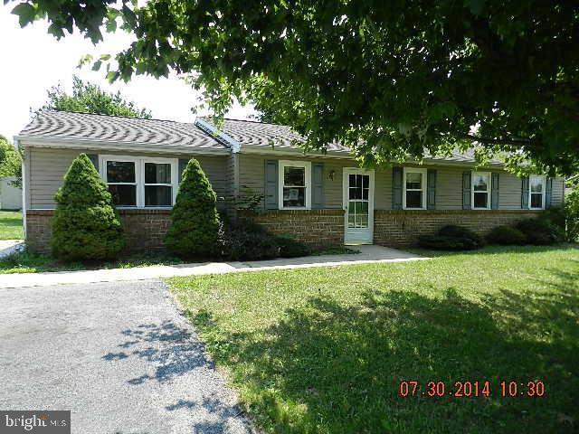 Nice Rancher on level 1.07 acre lot. Off street parking for 6 cars. Two sheds. Concrete patio. Double pane windows. Large eat-in kitchen with appliances and french door to patio. Three bedrooms each with a closet. Master bedroom has two closets. Den.  1st floor Laundry Room.  Home needs paint and carpet. Great country views!!