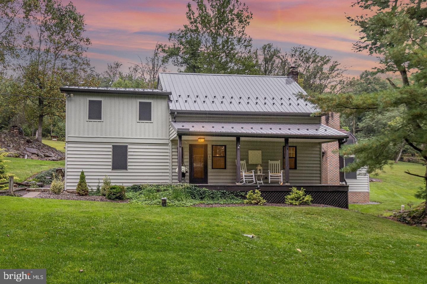 Walk right into this beautiful 3 Bedroom, 2 Bath farmhouse on 5.5 Acres situated just North of Lititz. This home brings lots of character with the original wood beams, stone fireplace, and gorgeous hardwood floors throughout. Enjoy overlooking the tranquil landscape of peach, pear, and apple trees from the heated sunroom. The family room brings lots of natural light into the home with skylight windows in the vaulted ceilings, and is open to a formal siting room for additional guests. On top of that you have a game room for the kids to play and just family fun. The second floor is also home to a beautiful primary suite offering a full bath and lovely bedroom. This property has lots of money saving features including solar panels, wood boiler heating system, newer well pump, 2 year old septic pump and pressure tank, as well as a outdoor generator hookup. Then as a added bonus checkout the large detached garage with additional storage, and a second floor for a man cave, work office or recreation room. Come check it out today.