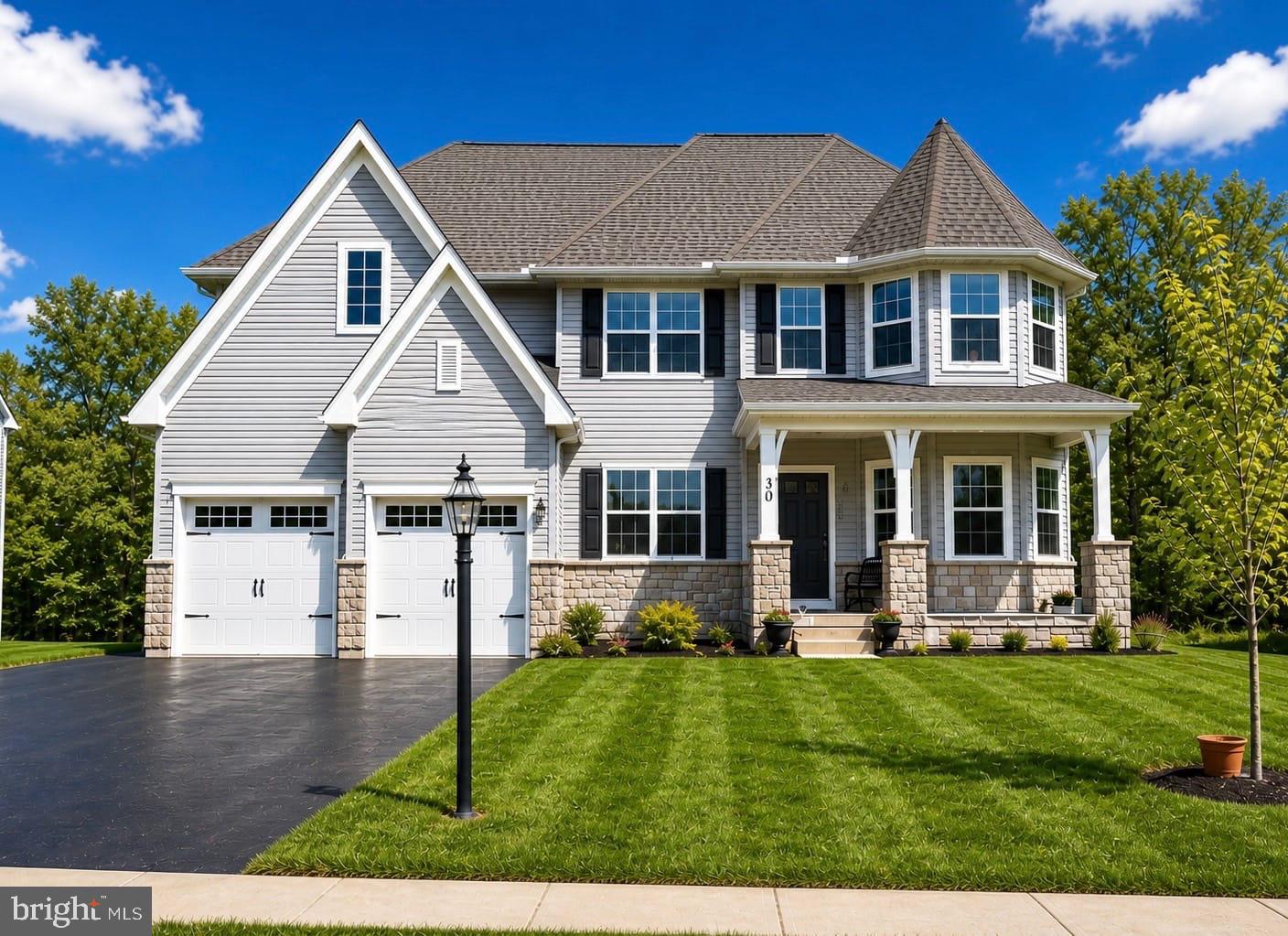 Nestled in a serene setting, this exquisite Colonial-style residence, built in 2023, offers a harmonious blend of modern luxury and timeless elegance. With five spacious bedrooms and four and a half beautifully appointed bathrooms, this home is designed for both comfort and sophistication. Step inside to discover an open floor plan that invites natural light to dance across the gleaming floors. The heart of the home features a 2-story living room adjacent to large kitchen perfect for hosting grand celebrations. The upgraded countertops in the kitchen are complemented by high-end stainless steel appliances, including a sleek gas range with exhaust hood, microwave, refrigerator, and dishwasher, making culinary adventures a delight.

An in-law suite on the main level, complete with a full bathroom, offers unparalleled versatility for multigenerational living.
Retreat to the master suite upstairs, where a generous walk-in closet provides ample storage, while the en-suite bathroom boasts elegant finishes that create a spa-like atmosphere. Each additional bedroom is thoughtfully designed, and features walk-in closets with multi-tier shelving. Equipped with modern recessed lighting throughout and ceiling fans in every bedroom.

The fully finished basement is a true gem, featuring a walkout to the stamped patio that seamlessly connects to the backyard outdoors. A convenient wet bar in the basement adds an extra touch of luxury, ideal for entertaining guests. With a full bathroom, sump pump and ample daylight, this basement is both functional and inviting. This versatile area can serve as a recreation room, home office, or additional living space, catering to your lifestyle needs. 

An expansive full-width deck provides the perfect setting for hosting outdoor events. Enjoy the tranquility of your surroundings with views of lush trees and woods, creating a peaceful backdrop for your daily life. 
The exterior of the home is equally impressive, showcasing a blend of vinyl and stone siding that enhances its curb appeal. The attached garage, with space for two vehicles, and EV charging outlet offers convenience and security. This property is not just a house; it's a lifestyle. Experience the perfect balance of luxury and comfort in a home that is designed for modern living. With its exceptional features and serene location, this residence is a rare find that promises to be a cherished retreat for years to come. Embrace the opportunity to make this stunning property your own and enjoy the exclusive lifestyle it offers.