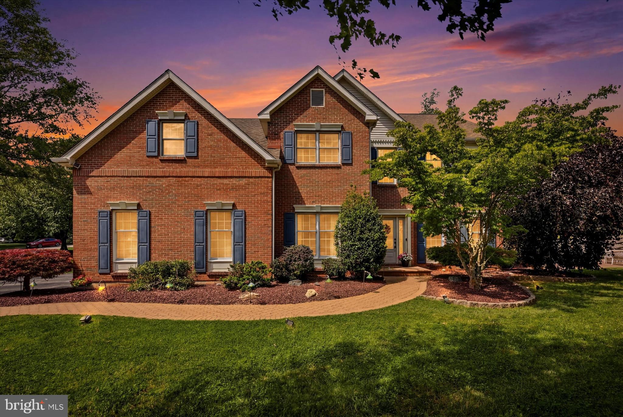 Welcome to 100 Linda Circle, where exceptional indoor-outdoor living meets one of Chester County’s most sought-after locations. Nestled on a beautifully landscaped .79-acre home-site in the highly acclaimed Downingtown Area School District, this brick-front home offers the perfect blend of elegance, comfort, and entertainment-ready spaces.

Designed for gathering, celebrating, and making memories, the home features a stunning sun room addition with soaring volume ceilings that opens seamlessly to a custom paver patio, expansive deck, and private backyard retreat. Whether you’re hosting summer barbecues, holiday gatherings, Eagles game watch parties, or intimate dinners with friends, this home was built to bring people together.

At the heart of the home is a custom Goebel gourmet kitchen featuring elegant cabinetry, upscale granite counter tops, a center island, and upgraded appliances—creating the perfect space for everything from weeknight meals to entertaining on a grand scale. The flowing floor plan effortlessly connects the formal and casual living spaces, allowing guests to move comfortably from room to room and from indoors to outdoors.

The main level showcases a dramatic two-story foyer, private study, formal living room, hospitality/bar room, elegant dining room, spacious family room with vaulted ceilings and a brick fireplace, powder room, and laundry room. Rich hardwood floors, custom tile work, updated lighting, and thoughtful finishes add warmth and sophistication throughout.

Upstairs, the spacious primary suite serves as a private retreat complete with a sitting area and updated bath featuring a granite double vanity, soaking tub, and separate shower. Three additional bedrooms and an updated hall bath provide plenty of space for family and guests. Recent improvements, including a newer roof and heating system, offer added peace of mind.

Beyond the property itself, you’ll love the lifestyle that comes with living in the sidewalk-lined Uwchlan Hunt community. Enjoy direct access to the Uwchlan and Struble Trail systems for walking, running, and biking, while nearby Marsh Creek State Park offers boating, kayaking, fishing, hiking, and some of the area’s most beautiful outdoor recreation. Conveniently located near Downingtown Borough, Exton shopping and dining, major commuter routes, and regional rail access, this home truly delivers the best of Chester County living.

A rare opportunity to own a home that combines everyday comfort, timeless style, and incredible entertaining space—all in an unbeatable Downingtown location.