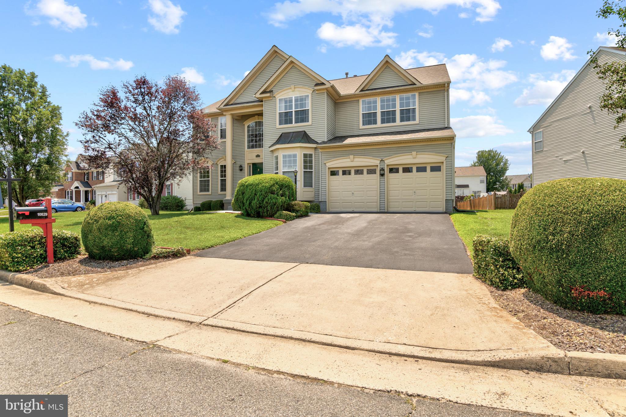 Welcome to 10829 King Nobel Lane, a beautifully maintained 4-bedroom, 2.5-bath Colonial offering timeless charm, generous living space, and recent updates that make it move-in ready. Freshly painted throughout with professionally cleaned carpets, this home has also been enhanced with a freshly power-washed exterior, updated trim paint, maintained gutters, and a refreshed deck.

Inside, you'll find gleaming wood floors, elegant wainscoting, and inviting living spaces designed for both everyday comfort and entertaining. The spacious family room features a cozy fireplace and flows seamlessly into the expansive kitchen, complete with a large center island, abundant cabinetry, and plenty of room for gathering with family and friends.

The oversized primary suite is a true retreat, featuring a private sitting area with a gas fireplace, a luxurious en-suite bath with a double vanity, and an expansive walk-in closet. Three additional bedrooms provide flexibility for family, guests, or a home office.

Step outside to enjoy the large backyard and deck—perfect for summer barbecues, outdoor entertaining, or simply relaxing. A two-car garage and extended driveway provide ample parking and storage, while the unfinished basement offers endless potential to create additional living space, a home gym, theater, or recreation room.

This home is surrounded by local parks, wineries, farmers markets, and shops/entertainment. The local schools are less than a mile away.