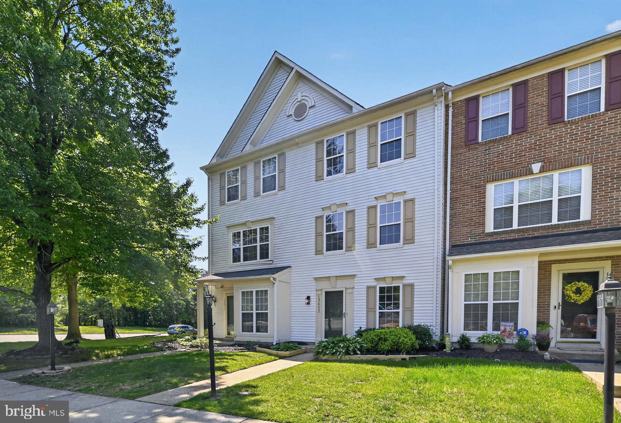 Completely refreshed and move-in ready in sought-after Kingsbrooke! This 3-bedroom, 2 full bath townhome offers three fully above-grade levels with stylish updates throughout. Enjoy all new finishes including a brand new kitchen, renovated bathrooms, new flooring, appliances, fixtures, and more.

The main level is designed for both everyday living and entertaining, featuring a living room bursting with natural light and a beautifully updated kitchen with seamless indoor-outdoor flow to your expansive rear deck overlooking the fenced backyard. Head upstairs to the second level where you will find a spacious additional sitting area centered around a cozy fireplace with direct access to the deck, creating the perfect space to relax or entertain. This level also includes a full bath and a well-appointed guest bedroom. The third floor is completed by your primary suite featuring a large ensuite bathroom with dual vanity, soaking tub, and glass shower, plus an additional third bedroom.

The fully finished walk-out main level leads directly to your fenced backyard. Enjoy the convenience of your own assigned parking space plus all the amenities Kingsbrooke has to offer, including a clubhouse, pool, tennis courts, jogging and walking paths, picnic areas, playgrounds,  and beautifully maintained community.