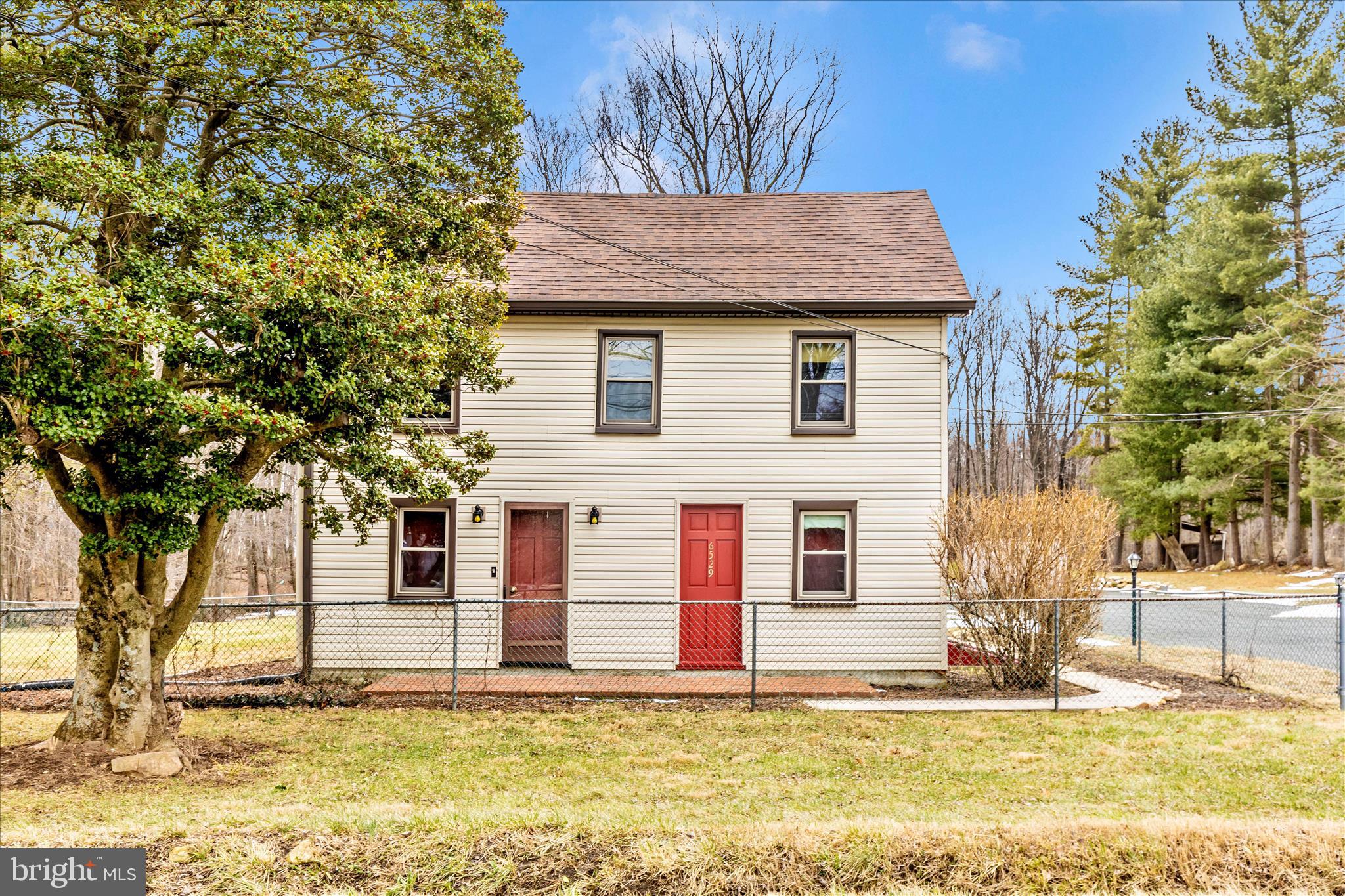 Discover the Charm of Country Living Just Minutes From Downtown Frederick. Welcome to this beautifully maintained 1910 farmhouse, perfectly set on nearly one acre of landscaped privacy in the highly desirable Mountaindale area. This property offers the rare combination of peace, space, and historic character, while still placing you conveniently just minutes from the heart of Frederick.

Step inside and instantly feel at home. Sunlight pours through every window, highlighting the warm wood finishes and the generous room sizes that older homes are known for.  A spacious eat-in kitchen filled with natural light. Inviting family perfect for relaxing or entertaining. A walk-up attic offering excellent storage or a future finished space. This home has been lovingly cared for and maintained, preserving its historic charm while ensuring modern comfort.
Enjoy all the beauty and privacy of country living:
Nearly one acre of open, usable lawn surrounded by mature trees
A cozy fire pit area for evening gatherings
Space to garden, play, entertain, or simply unwind
Two outbuildings with electricity, ideal for workshops, storage, hobbies, or equipment
A 50-amp RV hookup, perfect for travelers, guests, or recreational use
Quick, easy access to Route 15 for smooth commuting
No city taxes
A BAT septic system already in place
Just minutes to Downtown Frederick, local parks, shops, restaurants, and breweries

This property truly offers the best of both worlds—quiet country living with convenient access to everything Frederick has to offer.