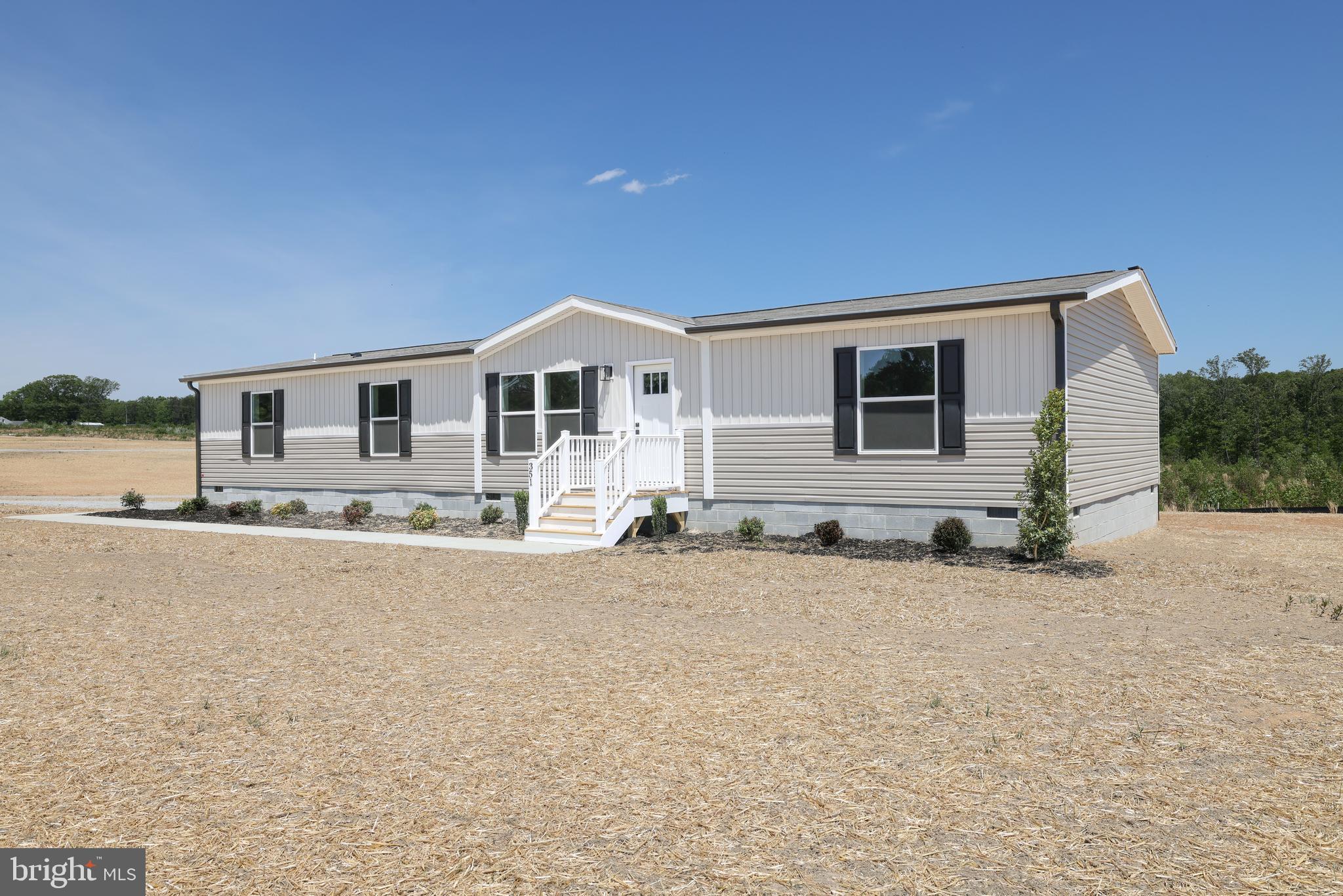 COMPLETE! Brand-new 3-bedroom, 2-bath home situated on 2.36 acres, conveniently located just minutes from Mineral and a short drive to Lake Anna. The interior offers 1,791 square feet of living space with an open floor plan, two living areas, and office space. Features include Shaw Lino flooring, a coffee bar area, decorative accent wall, large island and recessed lighting. The kitchen is well appointed with Duracraft cabinetry, stainless steel appliances, pot-and-pan drawers, a decorative range hood, and a utility room located just off the kitchen. The primary suite includes a double vanity and a spacious tub/shower combination. Exterior highlights include a farmhouse-style design, extensive landscaping, a large rear deck, and concrete walkways. Home is located within the Firefly internet service area!