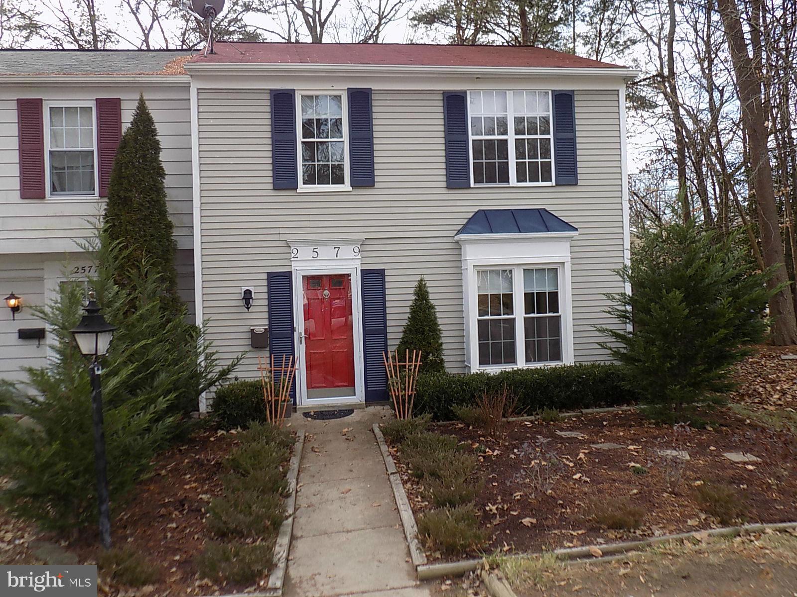 Freshly painted.  Well maintained.  Very nice wood floors, dual entry updated bathroom, rear deck, large backyard, fully fenced with privacy fence. Ceiling fans in all bedrooms.  Large Living Room/Dining Room combo.  End Unit. Attic with pull down stairs..