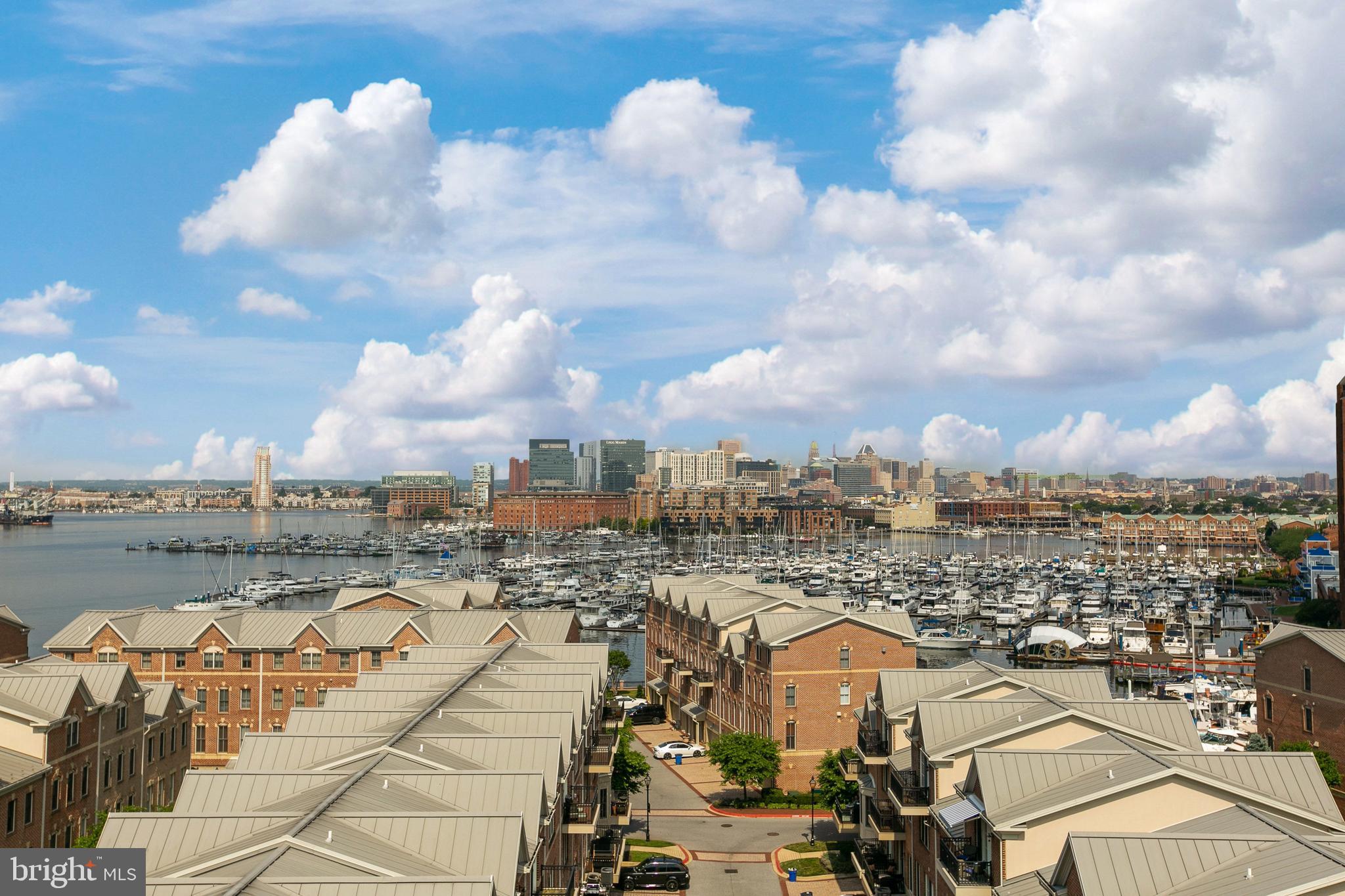 EXTREMELY SOUGHT-AFTER OPEN-CONCEPT 2 BEDROOM RESIDENCE WITH 2 FULL BATHROOMS ON THE CANTON WATERFRONT. INCREDIBLE CITY SKYLINE AND WATER VIEWS WITH PRIVATE BALCONY.  RECESSED LIGHTING. HARDWOOD FLOORS. TONS OF NATURAL LIGHT. UPGRADED STAINLESS STEEL APPLIANCES. DEEDED GARAGE PARKING SPACE. FULL-SIZE WASHER AND DRYER. CUSTOM CALIFORNIA CLOSET IN MASTER SUITE. 1,000+ SQFT. 24/7 CONCIERGE AND SECURITY.  FITNESS CENTER. CLOSE PROXIMITY TO RETAIL SHOPPING, LOCAL DINING, AND ALL MAJOR HIGHWAYS. SCHEDULE A PRIVATE TOUR TODAY!