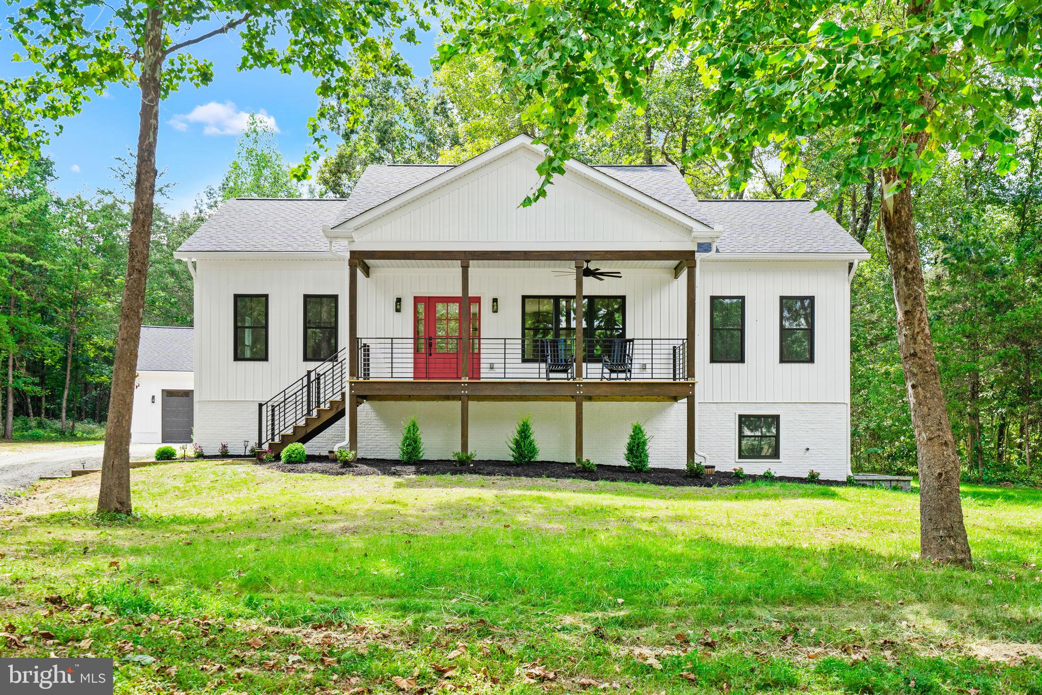 CUSTOM NEW CONSTRUCTION - 2,800+ SF - MOVE IN READY

Modern Farmhouse Retreat on a Private Wooded Lot

Welcome to this stunning modern farmhouse-style home nestled on a peaceful, tree-lined property offering the perfect balance of privacy, charm, and contemporary living.  With striking curb appeal, clean architectural lines, and a spacious covered front porch, this beautifully designed home makes an unforgettable first impression and statement.

Step inside to discover an open and inviting floor plan filled with natural light, stylish finishes, and comfortable living spaces perfect for everyday living and entertaining alike.  The elevated front porch creates the ideal setting for morning coffee, relaxing evenings, or gathering with family and friends while enjoying the surrounding natural beauty.

Property Features

Beautiful modern farmhouse exterior
Spacious covered front porch with ceiling fan
Bright open-concept layout
Large windows with abundant natural light
Peaceful wooded setting with privacy
Contemporary black-trim accents and designer touches
Generous yard with room to entertain, garden, or play
Convenient side access and ample parking
Detached oversized 2+ car garage with EV charger

This exceptional property combines modern elegance with quiet country living, creating a warm and welcoming place to call home.  Whether you’re looking for a serene retreat or the perfect space to host family and friends, this home offers comfort, style, and timeless appeal.

An excellent location for commuting, only 2 miles to Rt. 28 and 6 miles to Warrenton.   School district for Auburn Middle School and Kettle Run High School.   Right around the corner from the county’s largest lakeside park.  An absolute must see!