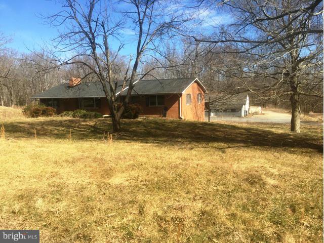 Great opportunity with country setting and easy access to amenities Waldorf/Brandywine but far enough away to enjoy a nice country setting on 2.06 Acres, AS-IS, vacant lot next door for sale Outbuildings that were used for home business full bath & electric