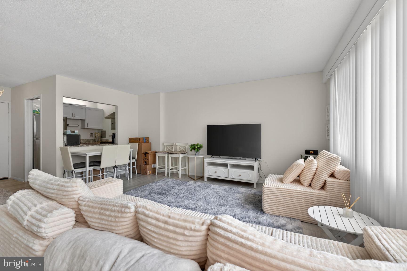 Stunning Fully Renovated Studio with Garage Parking in the Heart of Friendship Heights

Welcome to this beautifully renovated studio residence offering modern elegance, thoughtful design, and an unbeatable Friendship Heights location. Bathed in natural light, this sophisticated home features an open and inviting floor plan with luxury vinyl plank flooring throughout, fresh designer paint, updated lighting, a new electrical panel, and large windows that fill the space with natural light.

The stunning renovated kitchen is designed to impress, featuring sleek white cabinetry accented by modern cabinet hardware, a large stainless steel refrigerator, a contemporary vent hood above the stove, stylish countertops, and ample storage. A spacious breakfast bar cutout opens the kitchen to the living area and is highlighted by modern recessed lighting, creating the perfect space for casual dining, entertaining, or working from home. Whether preparing a simple meal or hosting guests, this thoughtfully designed kitchen blends beauty and functionality seamlessly.

The updated bathroom showcases elegant finishes, modern fixtures, and a clean, spa-inspired design. Connected directly to the bathroom is an extra-large walk-in closet, offering exceptional storage space and organization rarely found in a studio residence. This desirable feature creates the feel and functionality of a larger home while maximizing everyday convenience. The thoughtfully configured living area provides flexibility for both living and sleeping spaces, creating a comfortable and functional retreat.

This turnkey residence also includes a coveted garage parking space, offering convenience and peace of mind in this highly desirable location. With every detail thoughtfully updated, this home is truly move-in ready—simply bring your suitcase and start enjoying the lifestyle you deserve from day one.

Located in the heart of Friendship Heights, you're just blocks from Whole Foods, Lia's, Sushi Ko, Bloomingdale's, Wisconsin Place shops, Saks Fifth Avenue, Tiffany & Co., The Cheesecake Factory, Maggiano's, and the Friendship Heights Metro, providing effortless access to downtown Washington, DC and the entire metropolitan area.

Exceptional Building Amenities Include a Rooftop swimming pool and expansive sun deck, fully equipped fitness center, 24-hour concierge service, secured building entry, convenient in-building mini-market, Alfio's Italian Restaurant, as well as complimentary shuttle service to the Friendship Heights Metro, shopping, and other neighborhood destinations

Adding even greater value, the condo fee includes all major utilities, including gas, electricity, and water, making ownership simple, predictable, and hassle-free.

Perfect for first-time homebuyers, investors, or those seeking a low-maintenance lifestyle, this exceptional residence delivers outstanding value in one of the area's most sought-after communities.

Don't miss this rare opportunity to own a beautifully renovated, move-in-ready home with garage parking, utilities included, and resort-style amenities in one of Friendship Heights' premier full-service buildings.