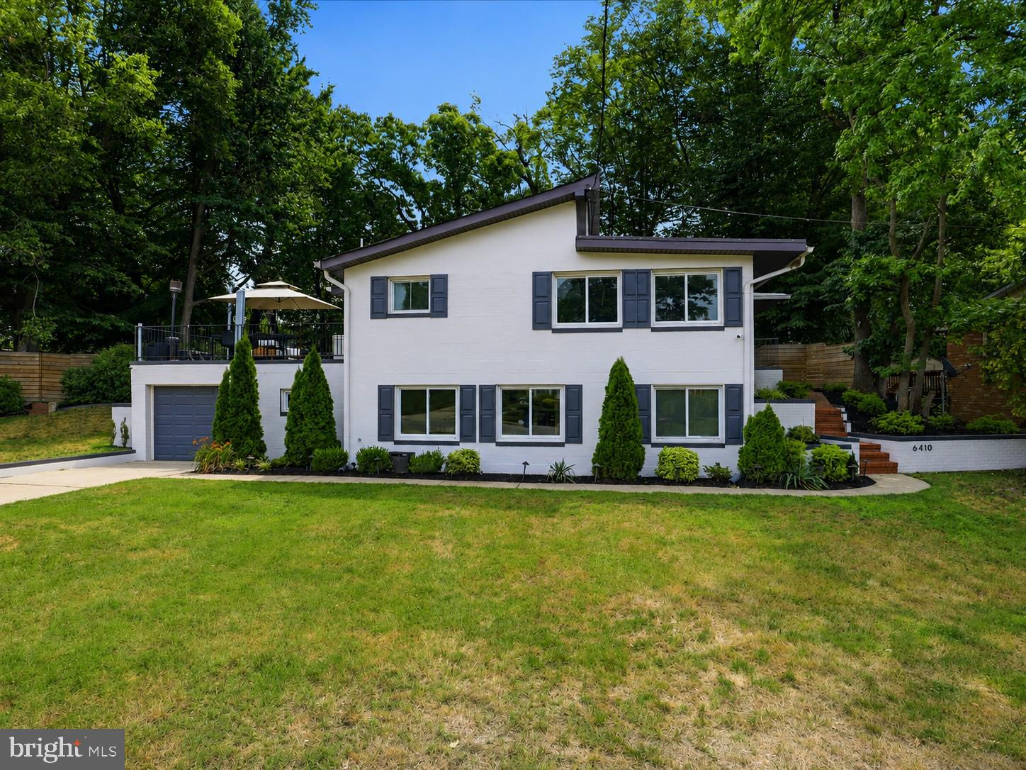 Welcome to 6410 Bushey Drive, a spacious 5-bedroom, 3-bath home offering the perfect blend of comfort, style, and functionality. Thoughtfully designed with an open and inviting layout, this home features generous living and entertaining spaces, an updated kitchen with ample cabinetry and workspace, and well-sized bedrooms to accommodate a variety of lifestyles. The finished lower level provides additional flexible living space, ideal for a recreation room, home theater, gym, guest suite, or home office. Step outside to your own private backyard retreat, complete with an in-ground pool that's perfect for relaxing or entertaining all summer long. Additional highlights include a one-car garage, smart home features, and convenient access to shopping, dining, parks, and major commuter routes to Washington, DC, National Harbor, Joint Base Andrews, and Northern Virginia. This move-in-ready home offers the space, versatility, and location today's buyers are looking for.