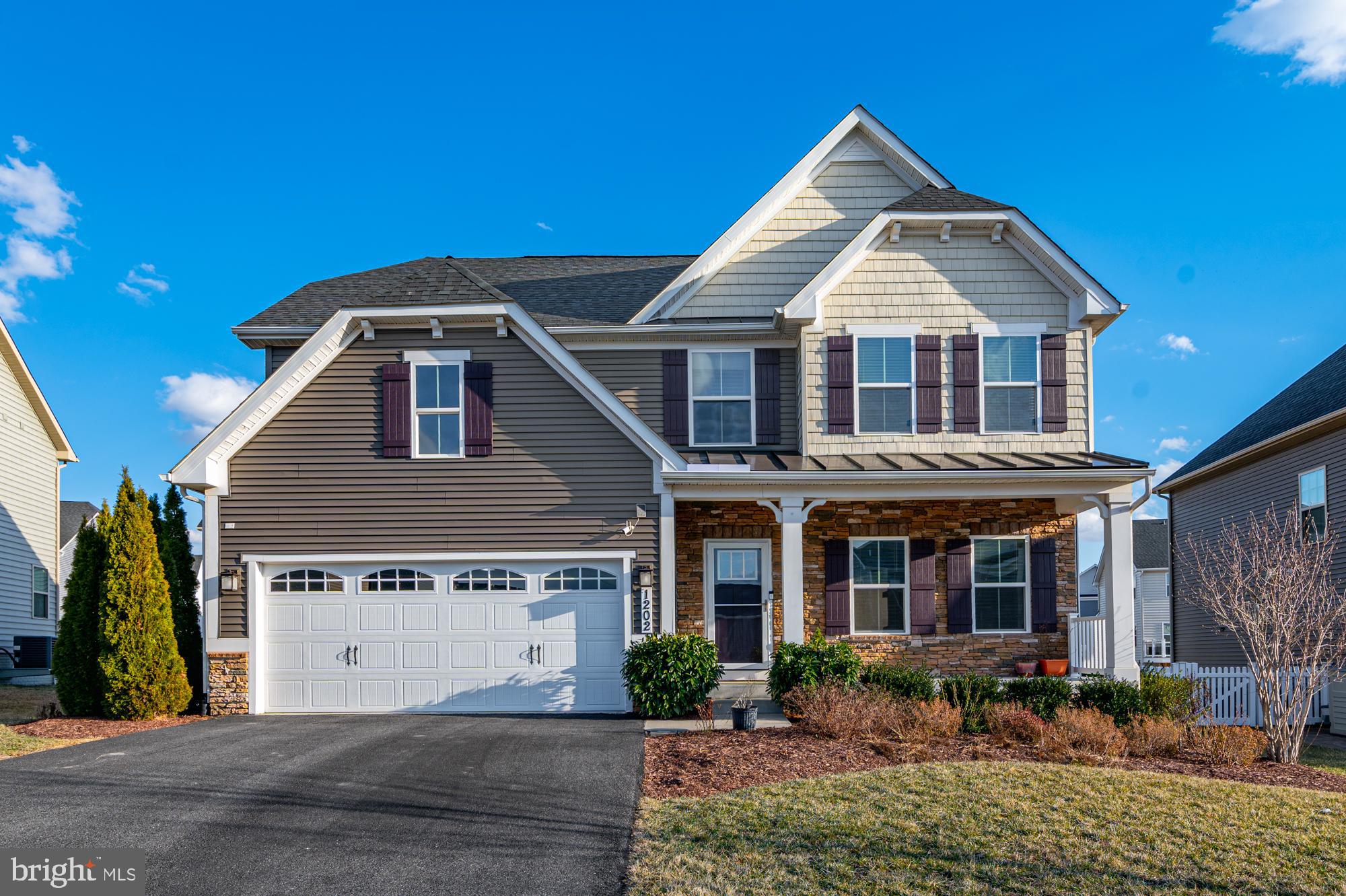 Stunning former model home, this popular Genoa floorplan has everything on your wish list! This is the perfect layout for anyone desiring one-level living.  Lovely, upgraded landscaping with underground water sprinklers, and a welcoming front porch beckon you inside to a wide and open foyer with a spacious office w/ French doors on your immediate right. Continuing down the hallway, you will have the laundry room,  and entrance from the 2-car garage featuring epoxy floors on your left, and powder room on your right. You will be very impressed by the completely open great room with a stacked stone raised hearth gas fireplace, perfect for cozy evenings. The kitchen is a chef's dream with stainless steel appliances, white cabinetry, subway tile backsplash, walk-in pantry, and a large island with seating. Adjacent to the kitchen is the breakfast/dining area with several windows that let in great light. Walk out to the large composite deck with stairs to the level and fully-fenced yard. The spacious primary suite can also be found on the main level.  Tray ceiling, large walk-in closet, and lovely bath complete this level. Upstairs, you will find a large loft/secondary family room flanked on each side by two very well sized bedrooms and one full bath featuring double sinks.  LED pocket lights in the majority of the rooms on the main and upstairs level make this home sparkle. The basement is a whopping 1,592 sq ft, and wide open, so you can let your imagination run wild with all of its possibilities.  This property is located on a short and quiet street close to the community dog park and all the many other amazing amenities of Brunswick Crossing, including swimming pool, fitness center, tennis courts, walking trails, sports fields, tot lots and stunning community center. Grocery store and many other conveniences are right inside the community as well, and downtown Brunswick has so many quaint bakeries, shops and restaurants for your enjoyment. Take the MARC train down to DC for your commuting needs, and on the weekends, walk down the scenic C&O canal to Harpers Ferry National Park just a stone's throw away. Don't miss your chance to make this lovely home yours. Schedule your showing today!