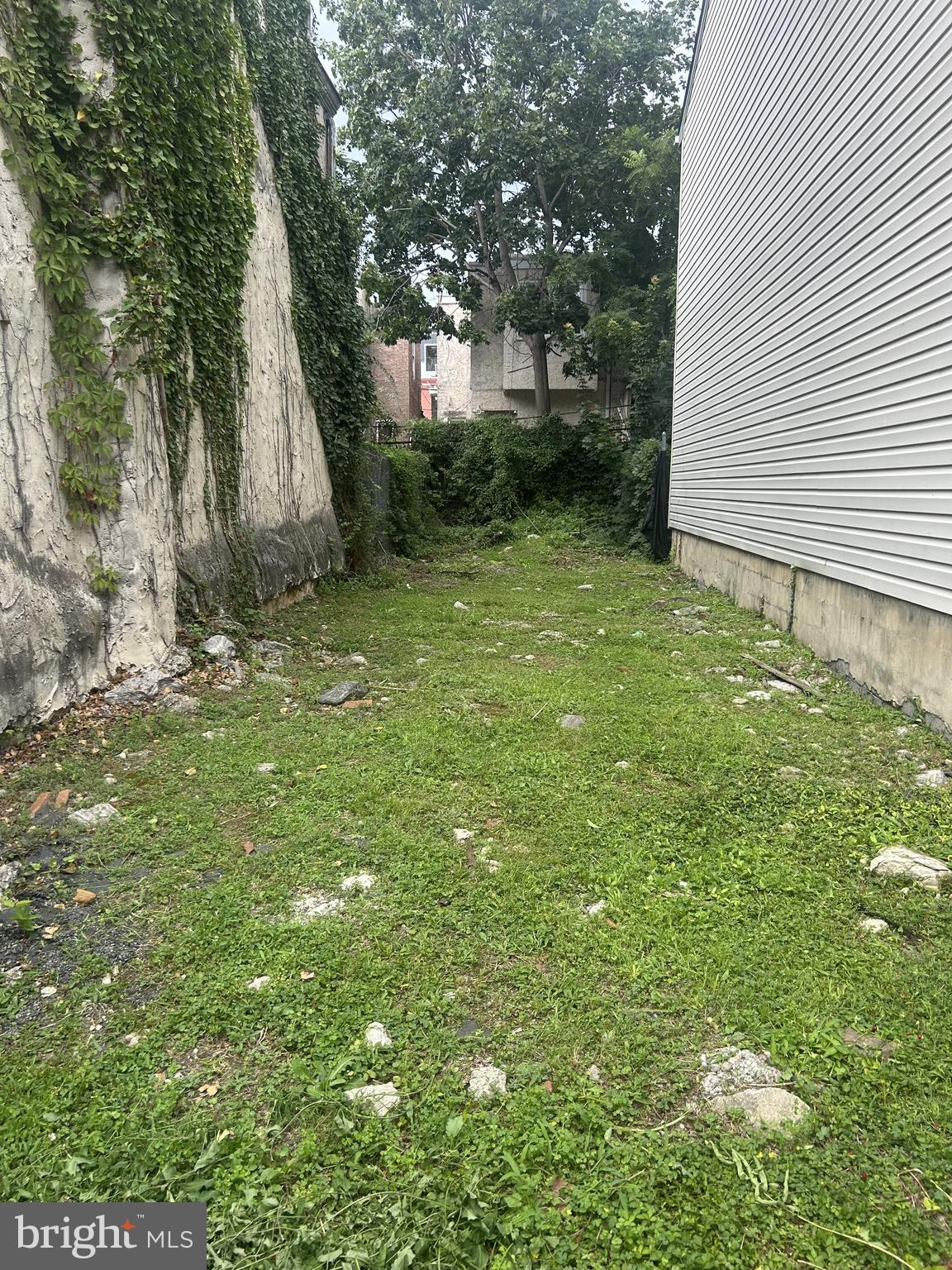 Development opportunity in West Philadelphia’s Cedar Park neighborhood. RM-1 zoned vacant lot suitable for multifamily or single-family construction.

Previously approved (zoning now expired) for a 3-story, 3-unit building. Architectural plans and engineering drawings available for reference.

An existing easement accommodates a neighboring structure; documentation available. Pricing reflects this condition, presenting an opportunity for experienced developers to capitalize on a well-located infill site.

Also available as part of a package with nearby corner parcel at 722 S 49th St (MLS#  PAPH2536772). Combined acquisition offers enhanced development flexibility and greater overall project efficiency. Seller will consider package pricing for both parcels.

Conveniently located near Baltimore Ave, Clark Park, University City, and public transit.

Property sold as-is. Buyer responsible for all due diligence, zoning, and permitting. Agent has financial interest.