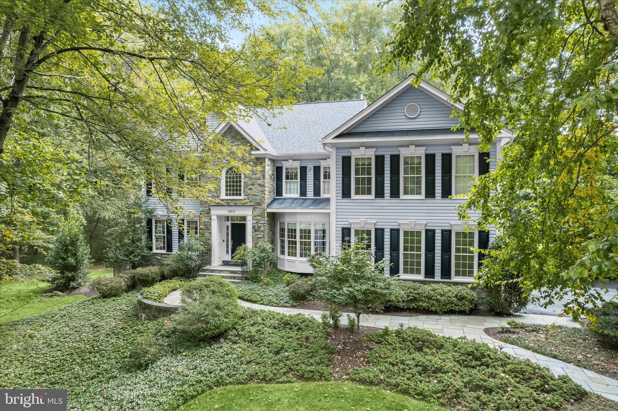 Exceptional transitional estate gracefully positioned on a private 2-acre cul-de-sac lot backing to a picturesque conservation easement in prestigious Brookville. Offering the perfect blend of elegance, comfort, and thoughtful updates, this stunning residence features 5 spacious bedrooms, 4 full baths, 1 half bath, and a desirable side-load 3-car garage.
A welcoming paver walk leads to the impressive exterior showcasing timeless stone and vinyl siding, mature landscaping, and beautifully designed outdoor living spaces. Inside, expansive light-filled interiors are complemented by refined architectural details, generous room sizes, zoned heating and cooling systems, and a cozy wood-burning fireplace that anchors the main living area. The fully finished walk-out lower level with storm door provides exceptional additional living and entertaining space complete with a bar area, wine cellar cooling system, and direct access to the backyard retreat.
Designed for seamless indoor-outdoor living, the rear grounds are truly resort-inspired. Enjoy a spacious Trex deck with dual staircases overlooking the private backyard oasis featuring an in-ground pool, hot tub, paver patio, stone garden walls, and aluminum fencing surrounding the pool area. The property also includes an invisible fence and backs to protected conservation land, creating a tranquil and private setting rarely found.
This meticulously maintained home has been extensively updated for peace of mind and modern efficiency. Major improvements include a new roof, gutters, downspouts, and gutter toppers (2023); fully owned solar system (2023); updated HVAC systems; new well pump and tankless water heater systems (2024); updated kitchen appliances including cooktop and dishwasher; Renewal by Andersen windows in the sunroom and family room; and a whole-house Generac generator. Additional enhancements throughout reflect true pride of ownership and careful attention to maintenance.
Offering the ideal balance of luxury, privacy, and functionality in a highly desirable location, this exceptional property presents a rare opportunity to own a beautifully updated estate home in the heart of Brookville.