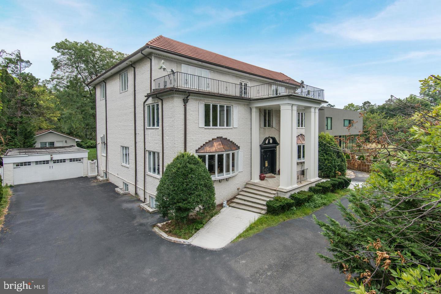YOU CANNOT FIND ANYTHING LIKE THIS HOUSE AND PROPERTY AT THIS PRICE!! Set up off the Avenue, this extraordinary home has amazing space!   Plenty of room for Everyone!  Many options for  home offices, including a terrific Guest House!     It s not at all what you expect from the exterior.  It is traditional, yet with open space where you want it.    Beautiful large Foyer,  entertaining size Living room with fireplace, Dinning room which can easily seat 20!,  Cook's  kitchen which is open to the breakfast room,  family room with fireplace.    The  2nd level boasts a fabulous Owner's  Suite with Renovated full bath and sitting room.  There are 2 additional bedrooms both with en-suite baths, study and powder room on the 2nd level.  Third level offers 4 spacious bedrooms and 3 renovated baths (two of which are en-suite), plus a bonus room.  Recently renovated lower level boasts a spacious Game room, workout room, half bath, bedroom, full bath, mudroom,  utility and laundry rooms.  Fabulous entertaining patio and  huge backyard (perfect for a Pool)!  The  Guest house includes a spacious living room, kitchen, bedroom, full bath and lower level,  great for storage!  There is a Detached, 2 car garage,  plus ample parking for six or more cars!