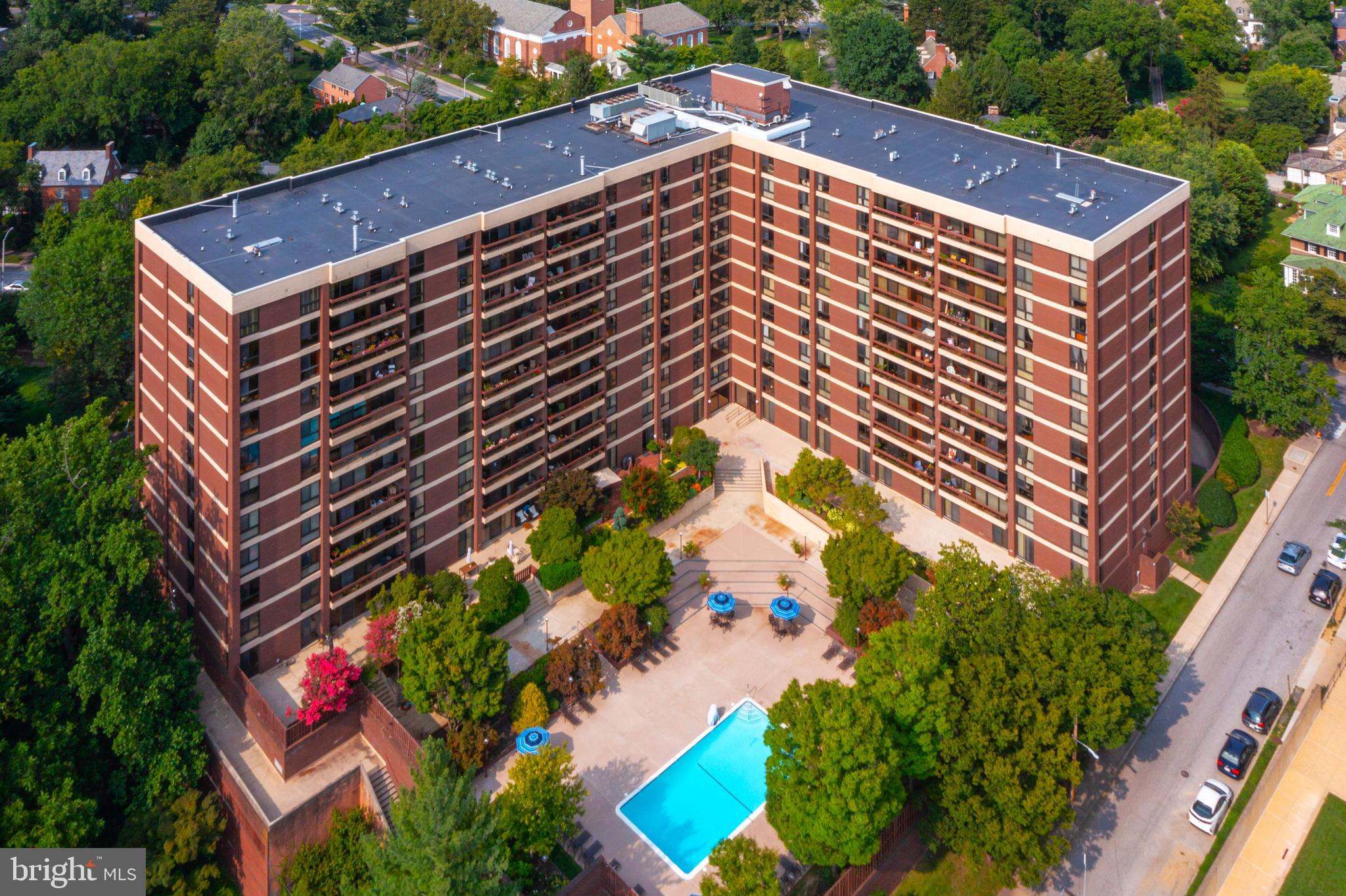 This condo home is priced to allow you to renovate to suit. And it’s quite livable as it is!  Enjoy this 8th floor condominium home with amazing westerly views overlooking the pool and the Tuscany-Canterbury neighborhood. The rooms are large and welcoming. This home is equipped with a washer/dryer combo, assigned deeded parking space, and storage locker. Condo fee: $1403.01 per month – includes heat, hot water, central A/C, building maintenance & more (excludes Wi-Fi and cable). Winthrop House amenities: 24/7 doorman & concierge, on-site maintenance & property manager, outdoor pool & fitness center, sauna, meeting/party room, guest suite for visitors, and then location, location, location! Just a short walk to Johns Hopkins University, the Baltimore Museum of Art, Gertrude’s Restaurant, Sherwood Gardens, and countless local cafes, shops, and amenities. Don’t miss this rare opportunity to live in one of Baltimore’s most convenient and charming neighborhoods—with all the perks of a full-service building. This building is renowned for being well-managed with high reserve funds. The balconies are resurfaced and refurbished. The roof and elevators were recently replaced here. There is no anticipated special assessment. Ask the listing agent about this fantastic building. His Mom lives here! Love living here!