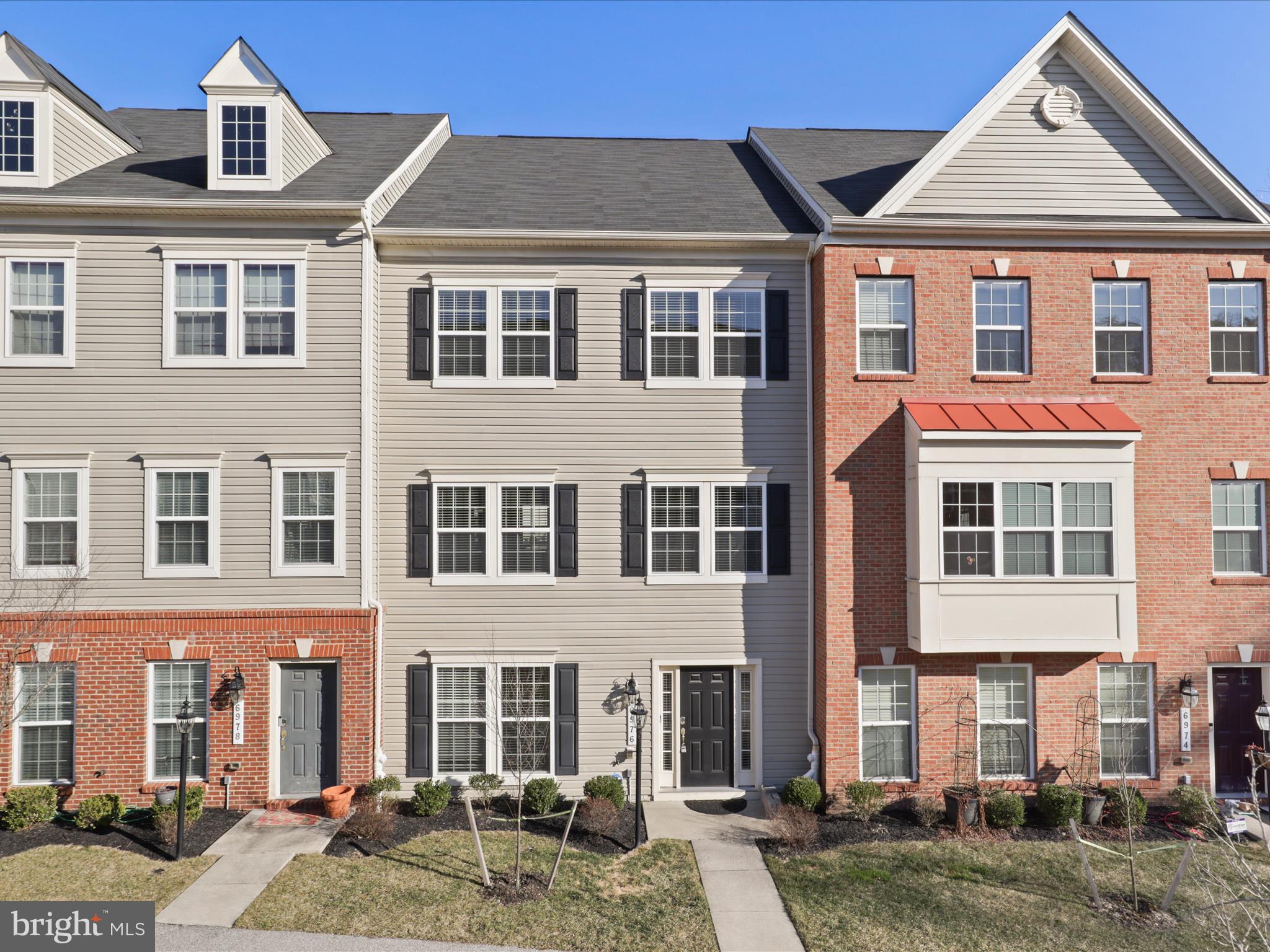 *Promotion* This house potentially comes with a 5% fixed rate! Step into luxury with this stunning three-level townhouse in the highly sought-after Oxford Square community! Boasting 2,700 square feet of modern elegance, this 2017 Lennar-built home offers 3 spacious bedrooms and 4 full baths. From gleaming wood floors and stylish crown moldings to a gourmet kitchen with granite countertops, 42-inch cabinetry, stainless steel appliances, and an oversized island—every detail is designed to impress. The open-concept layout is an entertainer’s dream, with a sun-drenched breakfast area leading to a private deck, perfect for morning coffee or evening gatherings. Retreat to the lavish primary suite, complete with a walk-in closet and spa-like bath, and experience comfort at its finest. Nestled against a wooded backdrop with scenic trails, this home offers access to top-tier amenities, including a pool, fitness center, clubhouse, and community barn. With easy access to major highways, BWI Airport, and MARC Train service, this home combines luxury and convenience in a prime location.