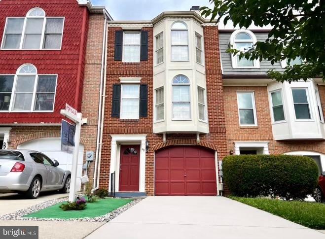 Nestled in the charming community of The Abbey, this delightful Colonial townhouse exudes warmth and character. Thoughtfully designed living space, featuring two spacious bedrooms, den space and four bathrooms, ensuring comfort and convenience for all. Step inside to discover a harmonious blend of modern functionality. The inviting family room, complete with a cozy quartz fireplace, pairs seamlessly with the eat-in quartz kitchen, which boasts a quartz island and dining space perfect for gatherings. Crown moldings enhance the home's sophisticated ambiance, while hardwood and luxury vinyl plank flooring add a touch of luxury throughout. The exterior is equally captivating, featuring classic brick and vinyl siding, complemented by charming bump-outs and exterior lighting. Enjoy serene moments on the deck. This townhome includes an attached garage and driveway parking. Convenience is key with community amenities such as basketball, tennis courts, and playgrounds.  Experience the unique craftsmanship and inviting atmosphere of this exceptional property, where every detail has been designed with comfort in mind. Don't miss the opportunity to make this charming townhouse your new home!