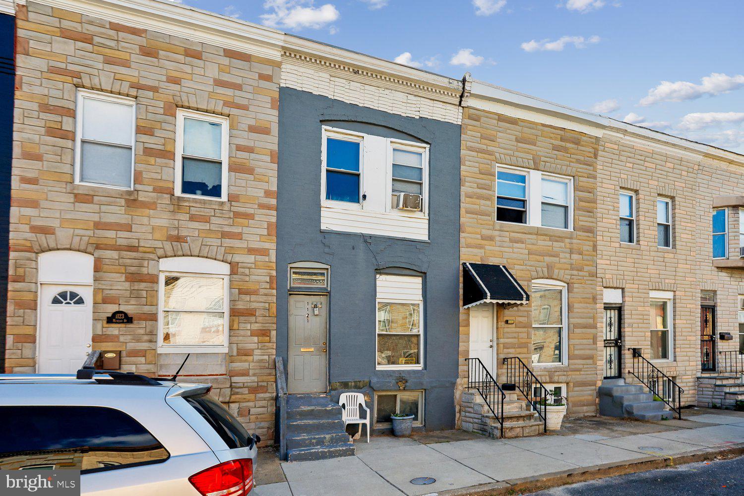 Charming unconventional 3 Bedroom 1 full bath, interior row townhome.  Made for a buyer looking to invest some TLC to improve the home to their standards. As a starter home buyer, can move in and gently schedule wanted updates to add personalized characteristics to the home.  Home has a spacious rear yard. Buyer can add and enjoy features such as, an outdoor garden, above ground pool, or possibly use the space for parking.