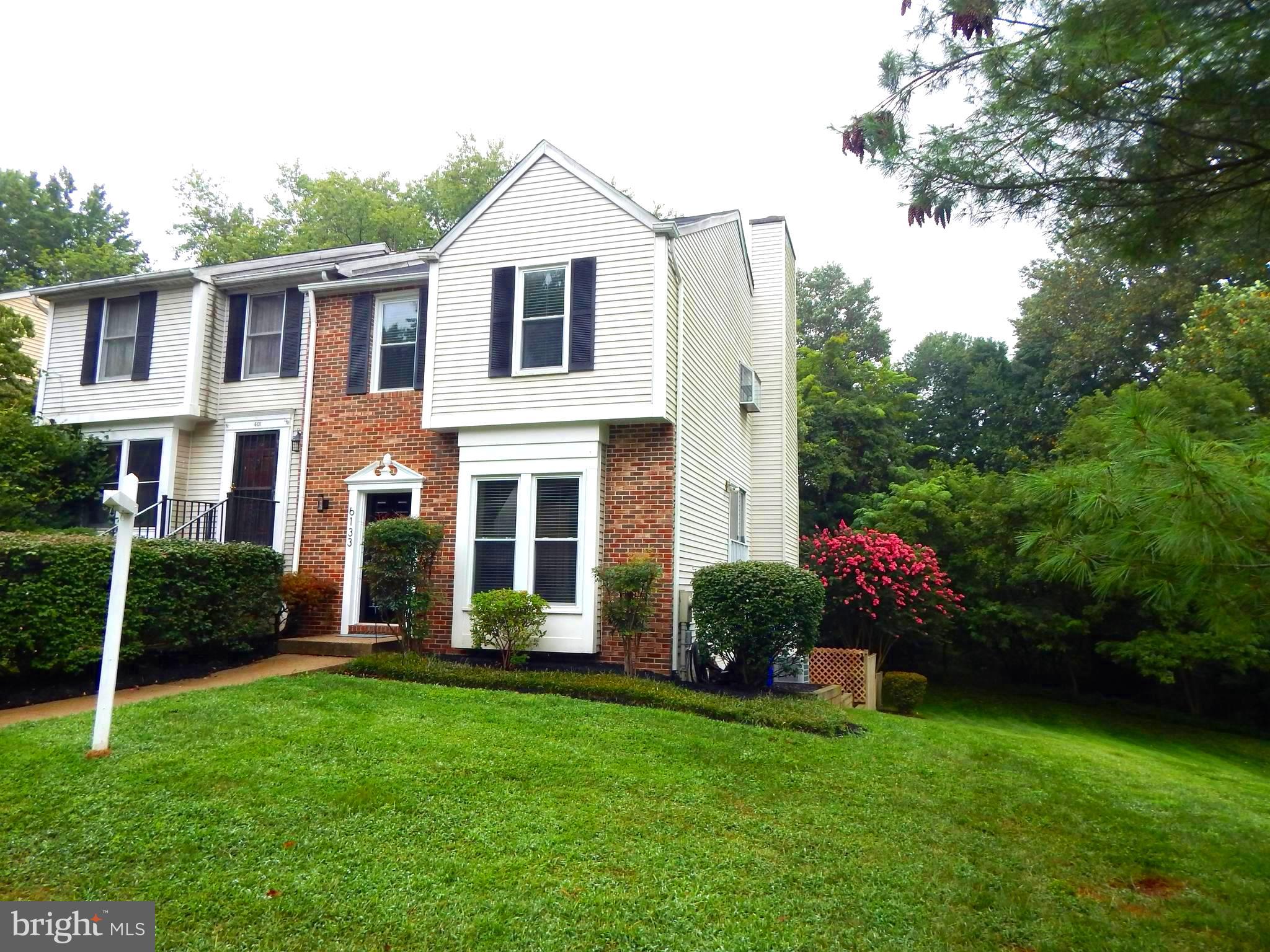 BIG PRICE IMPROVEMENT! This Beautiful EOG home has been completely renovated with modern, high-end finishes throughout.  Located in Cedar Acres, one of Columbia’s most desirable developments, this home rests on the choicest lot in the neighborhood.  This big, brick End-of-Group home is situated at the very end of the neighborhood and overlooks acres of open land and woods, and is very private.  Watch deer, foxes, squirrels, and other woodland wildlife from the privacy of your large, 2nd-story deck, as you enjoy your coffee and newspaper in the morning and cocktails with friends and family in the evening.  The home has almost 2,000 finished square feet and boasts a large, eat-in Kitchen that has been completely updated with new granite countertops, cabinets, and appliances.  Tons of cabinet space and plenty of room to cook!  Lots of New upgrades to enjoy for care-free living- new carpet, new paint, new roof, new water heater, new bathrooms, new lighting, etc.  Step up stairs to your huge Master Bedroom with an ensuite bathroom that features brand new tile floors, a large, hanging vanity with adjustable lighting, a Fog-Free mirror, and a waterfall faucet.  You will love the modern, frameless shower doors AND both Full baths feature Smart, Bluetooth Speaker exhaust fans that allow you to adjust the LED light with unlimited color combinations and BEST OF ALL, play your favorite music, podcasts, or news while you shower or bath!  Wonderful!  Take the stairs to the lower level, where you will find a big, family room with a wood-burning fireplace with a wood surround.  Step through the sliding glass doors to your outdoor retreat with another large deck leading you to a big, privacy-fenced backyard.  Laundry room features plenty of storage space.  But that’s not all!  The original builder added a BONUS to this home that no others have – sliding glass doors were added to the dining room, where another deck could be added to bring more of the outdoors into your new, wonderful home or additional entertaining space! Wow.  This home is close to everything you love about Columbia AND only 5 mins. to Rt 32, 10 mins. to I95, and only 15 mins. to BW Parkway and Fort Meade.   Miles and miles of walking/hiking paths just out your front and back door.   Come and visit, and you will call it home!