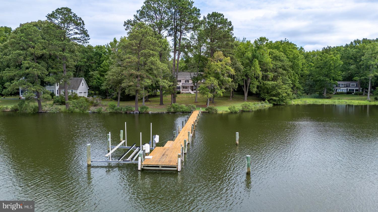 This Island Creek waterfront home located on deep water with a southern exposure and long shoreline is being sold for the first time since built in 1999.  Situated on 3.8 acres, every detail was thought out and executed by the owners and a top rate builder.

The house consists of 4,469 sq. ft. of living space plus a two car garage.  The house has an open floor plan, featuring a large eat in kitchen with views over Island Creek, the dock and an expansive well landscaped lawn that drops to the shoreline.

The kitchen is well appointed with top end appliances, tons of storage areas, pantry and is close to the laundry room and shop.

There is a primary bedroom suite on the first floor, a second bath, and three bedrooms and two full baths on the second floor.

There is a deck, patio and screened porch facing SW, all meticulously maintained.

The property is located in the “X” flood zone.  This is an extraordinary waterfront property located in the Oxford zip code on one of the best deep water creeks in Talbot County.