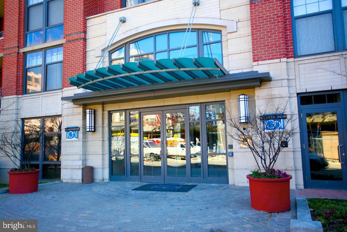 Welcome to this stunning one-bedroom condo ideally located in the heart of Clarendon. This spacious unit features hardwood floors and an open-concept kitchen and living area with granite countertops. The modern kitchen boasts stainless steel appliances and seamlessly opens to the living space. The upgraded bathroom includes a soaking tub and elegant tile work throughout. An in-unit washer and dryer adds to the convenience of everyday living. One assigned parking space is included in the rent—a rare find in such a prime location. Residents enjoy access to the recently renovated rooftop terrace with a pool, grilling area, and breathtaking panoramic views of the Capitol, Washington Monument, and National Cathedral. Just steps from the Clarendon Metro, top-rated restaurants, nightlife, Whole Foods, Trader Joe’s, and so much more—this home offers the ultimate urban lifestyle. This one won’t last—schedule your private tour today!