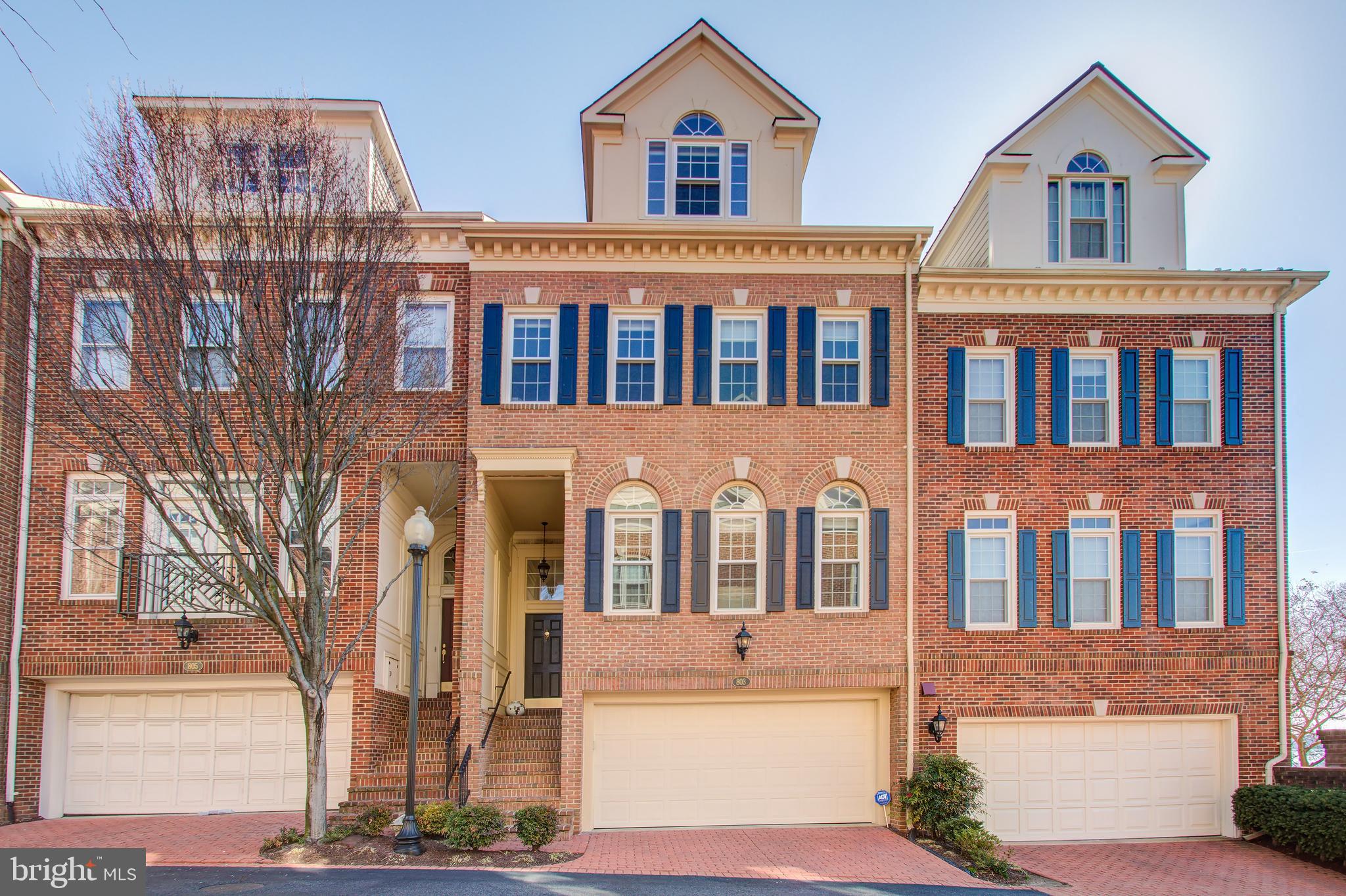 Spring weather and water views--Perfection on the Potomac!   Welcome to this stunning and spacious home with gorgeous upgrades throughout and serene, panoramic, oh-so-beautiful water views of the Potomac River. Located  adjacent to the City-owned Oronoco Bay and Rivergate HOA-owned Rivergate parks, this home offers beauty inside and out and an easy and most enjoyable way to take advantage of Alexandria’s  many waterfront recreation, shopping, dining and entertainment options. Major features include:   4 levels of elegant, upgraded and superbly maintained living space; Panoramic water views from the kitchen, family room, primary bedroom, primary  bedroom balcony and deck off kitchen;  Lovely foyer with high ceiling and steps to the sunny living and dining rooms; Open living and dining rooms with refinished hardwood floors; large  palladian windows, 9 foot ceilings, crown molding and recessed lights; Stylish, fully renovated kitchen with white cabinets, quartzite stone countertops, farmer’s sink, upgraded fixtures, carrara marble backsplash, range hood, gas cooking  and stainless Thermador appliances;  Sunny and bright family room with hardwood floors, two-sided gas fireplace, palladian windows with river views, access to the rear deck/patio adjacent to the kitchen; Three bedrooms, including a wonderfully bright and spacious primary bedroom  with dramatic cathedral ceiling, 2 upper windows, 2 closets and french doors leading to  a beautiful balcony with mesmerizing water views; Gorgeous fully renovated primary bath with oversized walk-in shower with multiple shower heads, carrara marble, double vanity with quartzite counters, upgraded lighting and brushed nickel fixtures; Two additional bedrooms, including one on the primary bedroom level and one  on the upper level which has a high vaulted ceiling, 2 enormous walk-in storage  closets and a third traditional closet;  Two additional renovated full bathrooms with natural quartzite counters, carrara  marble, brushed nickel fixtures and lighting; A main floor, elegant powder room;  Refinished hardwoods throughout the main level and on the stairs and lower level;   Stark 100% wool carpeting in bedrooms;  Lower level bonus room with separate areas for work, play or hobbies and activities of choice;  Hunter Douglas Silhouette shades throughout the home;  Full window replacement throughout the home; Maintenance-free Trex decking on primary bedroom balcony;  New awning over rear ground floor deck;  Large 2 car garage with brick parking pad for additional parking space in front;  Roof replacement with 50 year warranty