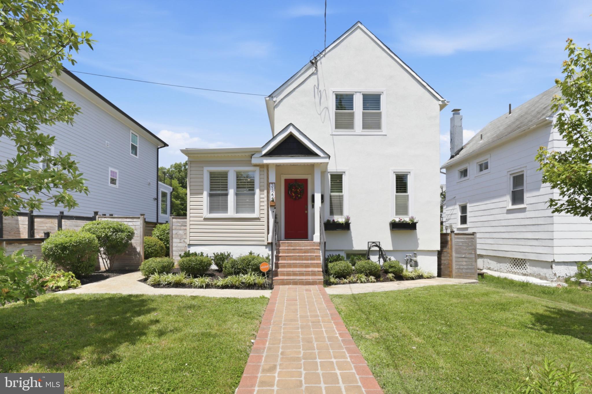 This home has been thoughtfully and extensively updated since it was purchased in 2023, blending stylish modern upgrades with meaningful behind-the-scenes improvements that enhance both everyday living and long-term peace of mind. The kitchen has been beautifully refreshed with upgraded Café appliances, including an induction range, dishwasher, and refrigerator, complemented by a farmhouse sink, tile backsplash, and a vented range hood, bringing both functionality and elevated design to the heart of the home. Luxury vinyl plank flooring has been installed throughout the first and second floors, creating a cohesive, durable, and contemporary feel. The primary en-suite bathroom and second-floor hall bathroom were professionally renovated in 2025 and fully updated from top to bottom with modern finishes, including a soaking tub in the hall bathroom for added comfort and relaxation. Additional interior improvements include a new LG washer and dryer, making daily routines effortless and efficient.

Significant exterior and infrastructure investments further set this home apart. The front façade was carefully restored, including replacement of deteriorated wood behind the stucco and complete re-stuccoing of the front of the home, preserving curb appeal while addressing important structural integrity. Charming exterior flower boxes add warmth, character, and a cozy, welcoming feel from the moment you arrive. In 2026, professional foundation waterproofing improvements were completed, including excavation, sealing, and installation of a Bituthene waterproofing system, successfully resolving prior water intrusion concerns and backed by a transferable 25-year warranty. For modern convenience, a Tesla EV charging station has been installed, enabling easy at-home charging. The fully fenced backyard offers exceptional privacy and flexibility, with a 6-foot privacy fence, dual side-gate access, and rear gate access to the off-street parking area. The rear gate supports are also suitable for the future installation of an automated gate system, adding another layer of potential convenience.

Outside, the landscaping has been lovingly enhanced to create a vibrant, garden-forward setting that feels both beautiful and intentional. The yard now features pollinator gardens, rose plantings, vegetable and flower gardens, and several mature ornamental trees, including maple, magnolia, and redbud varieties. These improvements create a lush outdoor environment designed for relaxing, entertaining, gardening, and enjoying the changing seasons. From the renovated bathrooms and upgraded kitchen to the waterproofing, EV charging, restored façade, private fenced yard, flower boxes, and thoughtfully cultivated gardens, this home reflects true pride of ownership and a rare level of care since 2023.