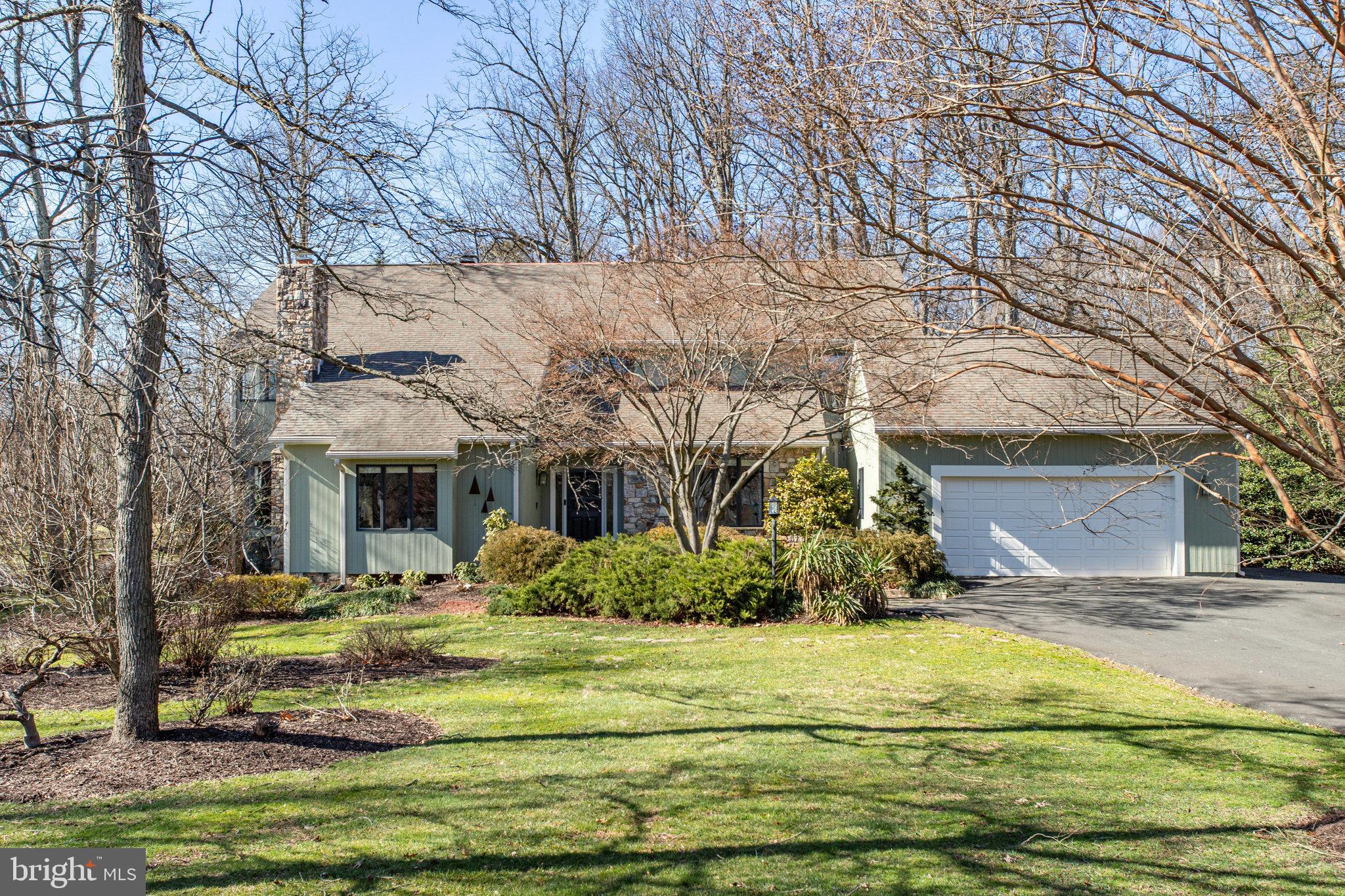 Welcome to this custom contemporary, designed for entertaining, cooking, and everyday comfort.  Modern yet warm, the flowing spaces reveal marvelous design elements and materials at every turn.  The exterior’s stone features seamlessly merge into the living room, family room, porch, and lower level with their four fireplaces.  Buyers who appreciate fine design will enjoy the vaulted ceilings, classic finishes, expansive windows, and optimal functionality.  The refreshing outdoor living areas include a beautiful screened porch, expansive deck, and stone patio.  Offering 5 bedrooms and 5 full baths this residence is a lovely place to comfortably host guests and call home.