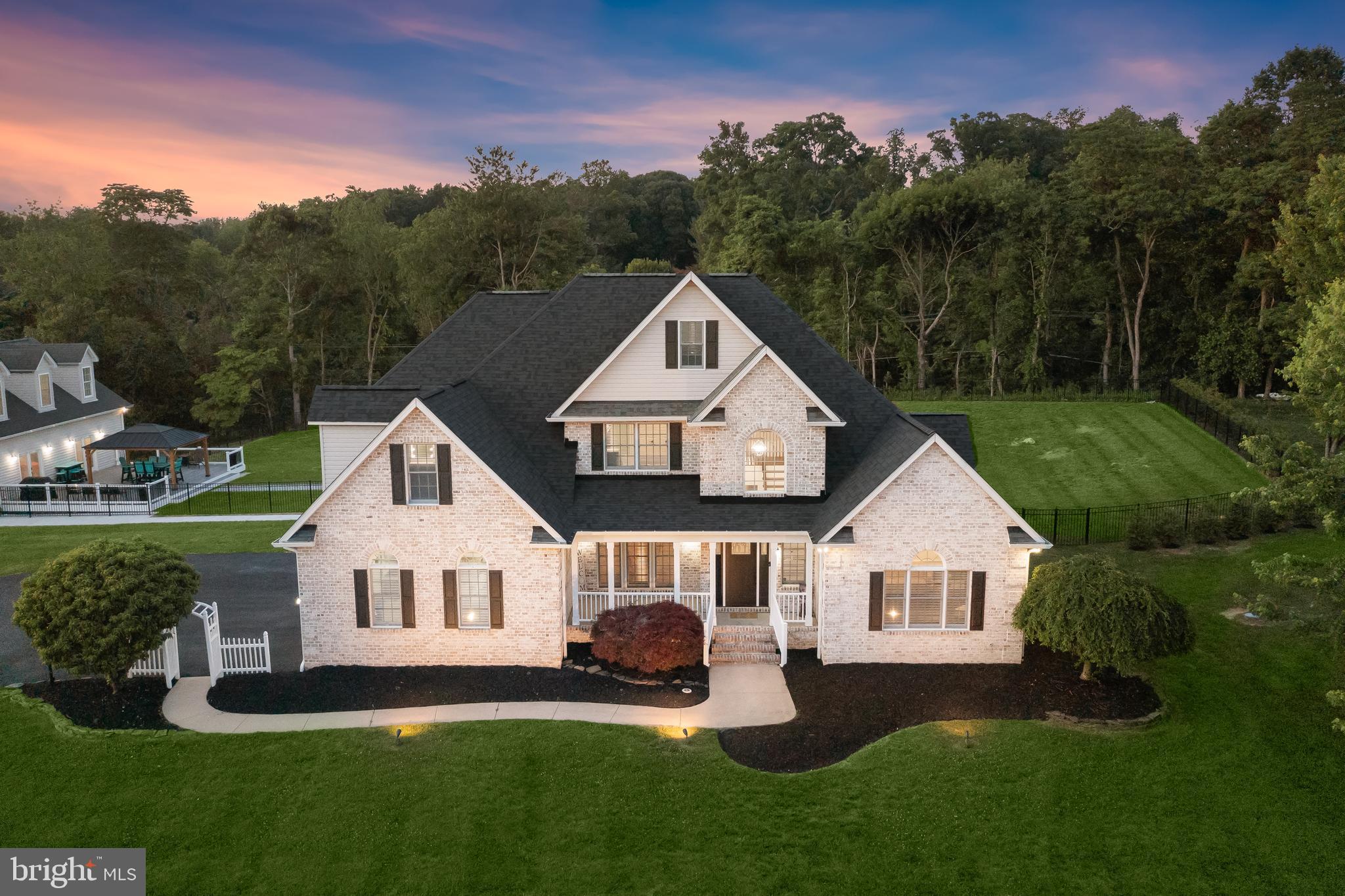 Welcome to 3003 Sheffield Court, a truly extraordinary,  one of a kind residence offering luxury, flexibility, and unparalleled entertaining space in a private Fallston setting. Thoughtfully designed for both everyday comfort and unforgettable entertaining, this stunning residence offers five spacious bedrooms, a finished upper-level loft area, and an incredible lower level featuring a custom bar, kitchenette, recreation areas, bonus room or office, and a fully soundproof theater room complete with luxury seating and big screen TV . 
At the center of the home, the gourmet kitchen impresses with crisp white cabinetry, quartz countertops, stainless steel appliances, a large center island, walk-in pantry, and bright breakfast area perfect for gathering with family and friends. The luxurious first floor primary suite offers a peaceful private retreat with refinished hardwood floors, a cozy propane fireplace, dual closets, private outdoor access, and a beautifully updated spa-inspired bath featuring a soaking tub and oversized walk-in shower.
Outside, the property transforms into a private backyard oasis. Enjoy the spectacular BRAND NEW 56' x 26' resort-style in-ground pool featuring an EcoFinish surface, smartphone automation, Elephant walk on pool cover, and a breathtaking 50-foot waterfall designed by Elite Pools. Expansive hardscaping, a fire pit, gazebo, hot tub, lush landscaping, and privacy fencing create the ultimate setting for relaxation and entertaining.

Adding even more value and flexibility is the detached three-level structure offering a lower level, three-bay garage and workshop with commercial-grade electrical service, a main level, expansive party room with kitchenette, bathroom and laundry, and a private upper-level guest suite with full bath. Whether utilized for multi-generational living, a home-based business, car collection, hobbies, or hosting unforgettable events, the possibilities are endless.
Extensively upgraded throughout with Bosch HVAC systems, renovated kitchen and baths, custom trim work, updated flooring, finished lower level, pool installation, and countless additional improvements, this home presents a rare opportunity to own one of Fallston’s most unique and versatile luxury properties.    Exceptional craftsmanship, resort-style amenities, and unmatched versatility come together to create a truly one-of-a-kind living experience.
Formal write up and professional photos, Aerial shots, layout diagrams and videos coming soon!  Stay tuned!