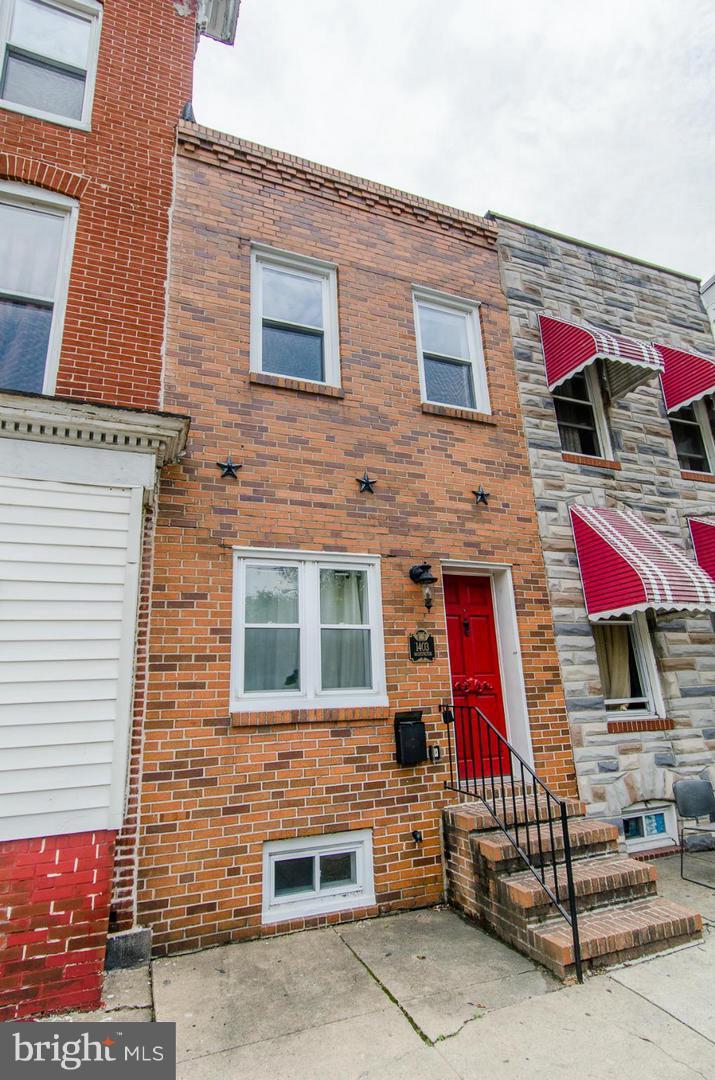 STYLISH WASHINGTON VILLAGE RENOVATION WITH 3 FINISHED LEVELS & OVER 1,400 SQ. FT. OF LIVING SPACE! Hardwood floors throughout upper levels, spacious LR with crown molding & exposed brick, gourmet kitchen with granite counters & stainless steel appliances, main level half bath, 2nd level Master suite with full bath & 2nd bedroom with hall bath, finished basement with family room, rear deck & large fenced patio. Steps from Carroll Park...