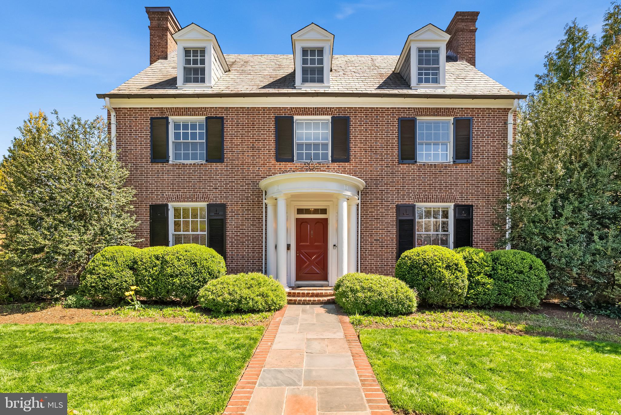 Open House Cancelled - Welcome to this impeccably maintained and masterfully renovated Georgian Colonial, privately nestled on Guilford’s hidden gem, cul-de-sac, offering exceptional privacy and a quiet, secluded atmosphere. Thoughtfully reimagined by renowned architect Austin Childs of the Monkton Design Build Group, this residence blends timeless architecture with sophisticated modern upgrades.
Step beneath the charming covered portico and through the classic vestibule into an impressive three-story foyer. To your left, the formal dining room connects seamlessly to a beautifully enclosed side porch—now transformed into a stylish butler’s pantry, complete with custom cabinetry, a wet bar, and dishwasher.
The gracious living room is anchored by a wood-burning fireplace and opens to a light-filled sunroom, ideal for morning coffee or evening relaxation. The chef’s kitchen is a showstopper, featuring Rojahn custom cabinetry, granite countertops, double wall ovens, a warming drawer, wine fridge, and a breakfast bar.
At the heart of the home is a stunning 2011 addition: the sunny breakfast area with built-in banquette flows into a spacious family room adorned with rich custom built-ins, surround sound, radiant heated stone floors, a wet bar, and a dramatic custom cupola that floods the space with natural light. French doors lead to a professionally landscaped, fenced backyard oasis—complete with a bluestone patio and cozy fire pit crafted by Natural Concerns.
Upstairs, the expanded primary suite features a custom-designed dressing area with built-in cabinetry and shelving. Two additional bedrooms share a stylish hall bath on the second level. The front bedroom features custom cabinets and shelving units, perfectly designed to be utilized as a convenient home office.  Two more spacious bedrooms, sizeable cedar closet, and another full bath await on the third floor.
A detached garage, accessed via the rear alley, provides added storage and convenience. The lower level includes a laundry room, abundant storage, and a high-efficiency furnace installed in 2023.
This extraordinary home offers the perfect blend of historic charm and modern luxury—a rare find in the heart of Guilford. Professional  Showings Beginning  Wednesday,  April 23rd - Photos to Come