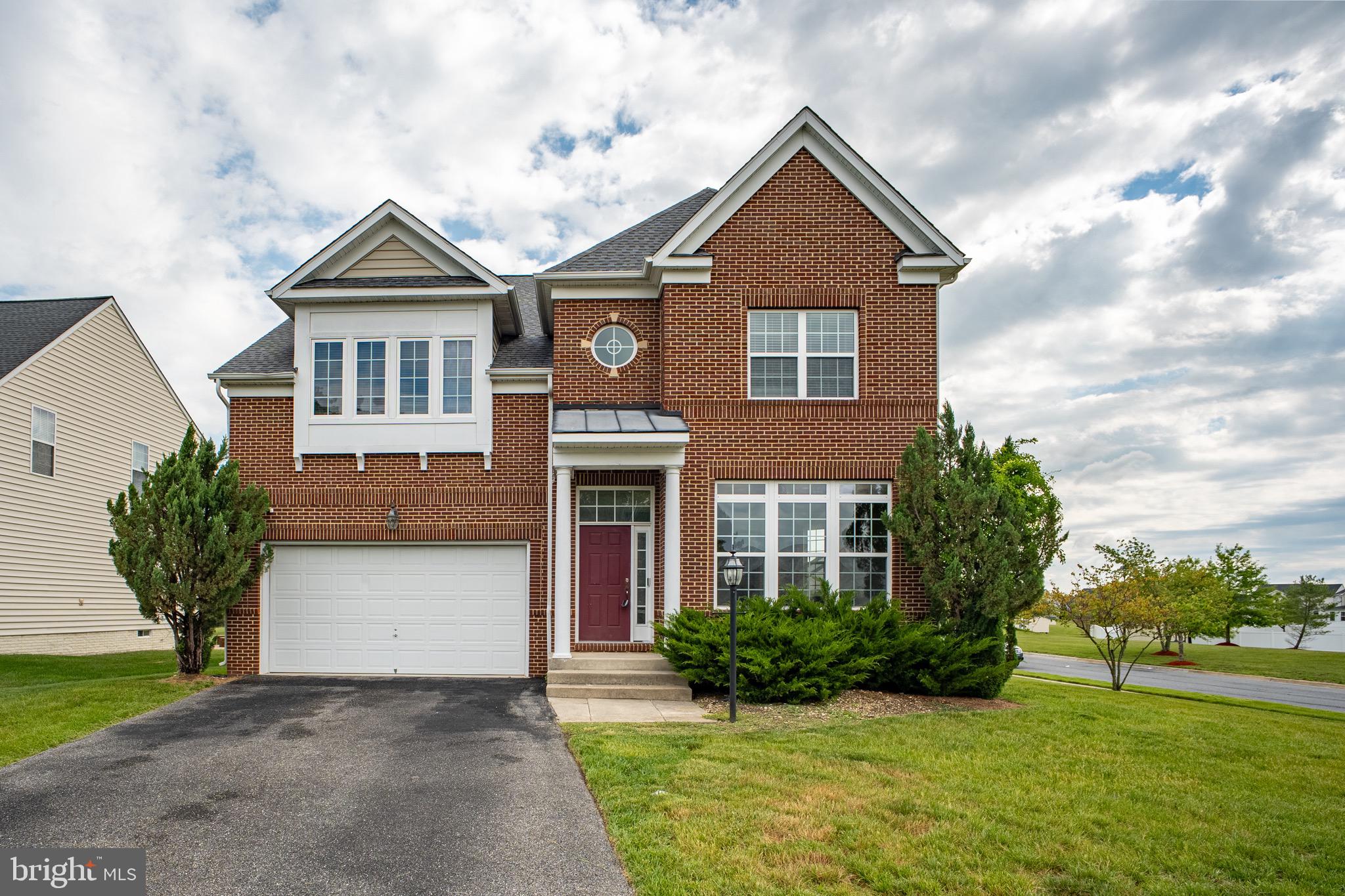 Move-In Ready & Freshly Updated! Welcome to 7108 Sudley Avenue, a stunning 6-bedroom, 4-full-bath colonial in the sought-after Lakeview at Brandywine community. This home has been professionally refreshed with a brand-new custom paint palette across all three levels, offering a crisp, modern aesthetic that is truly "turn-key."

Spanning over 4,300 sq. ft. on a premium 0.34-acre corner lot, the main level features an open-concept design with gleaming hardwood floors, a formal dining room, and an inviting family room with a cozy fireplace. The gourmet kitchen is a chef's delight, complete with a sun-drenched breakfast nook.

Retreat to the upper level's spacious bedrooms, including a luxury primary suite. The fully finished walk-out basement—also freshly painted—provides two  bedrooms and a full bath, perfect for an in-law suite, home office, or guest quarters. Enjoy the high-efficiency benefits of the NEW HVAC system and the convenience of being minutes from Brandywine Crossing and major commuter routes. Sparkling clean and ready for its new owners!