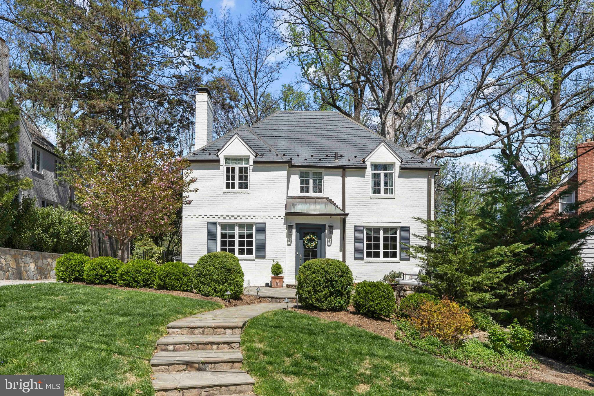Luxurious and upgraded, this 5 bedroom, 4.5 bathroom classic center hall colonial rests on a beautiful landscaped lot with welcoming front patio in the picturesque quiet Rollingwood neighborhood of Chevy Chase.  The main floor includes a light filled foyer, stunning living room with fireplace and lots of natural light, dining room is perfect for family gatherings and entertaining. The professional grade gourmet kitchen is open to the family room complete with stone fireplace and casual dining area.  Beautiful hardwood floors run throughout the first and second floors.    The second floor continues the elegant theme of this gorgeous home with 4 large bedrooms, 3 bathrooms and a Primary Suite you must see to believe with 2 large walk-in closets and a show stopping new bathroom, completed in 2022.   The third floor is a light filled bedroom with tree top views.   The home’s lower level is complete with a private entrance, laundry room, full bathroom, and open space perfect for use as a playroom, movie theater, or home gym.   The quality of this home flows into the backyard with a space perfect for any occasion that includes a screened porch, expanded patio, and exterior lighting.   This home blends perfectly all the modern conveniences of a modern home while maintaining all of the charming characteristics that make this neighborhood so unique.  The Rollingwood neighborhood is in close proximity to several parks, convenient to Brookville Market, short distance to downtown Bethesda, and easy access to Rock Creek Parkway for anyone traveling downtown.