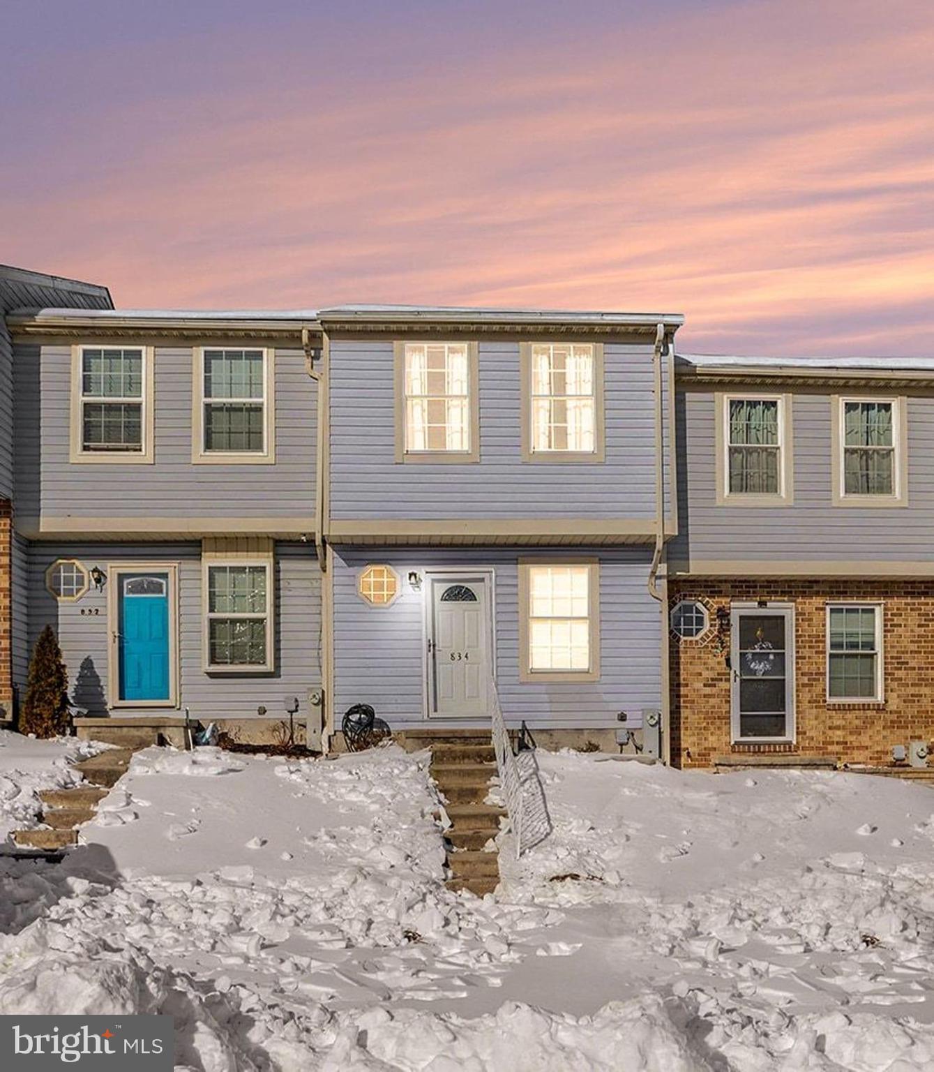 Back on the Market.  Buyer failed to preform.  Welcome home to this beautifully 2-bedroom, 2-bath townhome located in the desirable Woodbridge Center community. Thoughtfully designed with style and functionality in mind, this home features luxury vinyl flooring and a stunning herringbone butcher block countertop that adds character and charm to the kitchen. The eat-in kitchen is equipped with stainless steel appliances and flows effortlessly into the dining room and living room, making it perfect for everyday living and entertaining. Step outside to your private deck, ideal for relaxing or hosting guests. The lower level offers a spacious family room plus a bonus room, providing flexible space for a 3rd bedroom, home office, gym, or guest area. With generous living space throughout and a fantastic community setting, this townhome is ready for you to move in and make it your own.