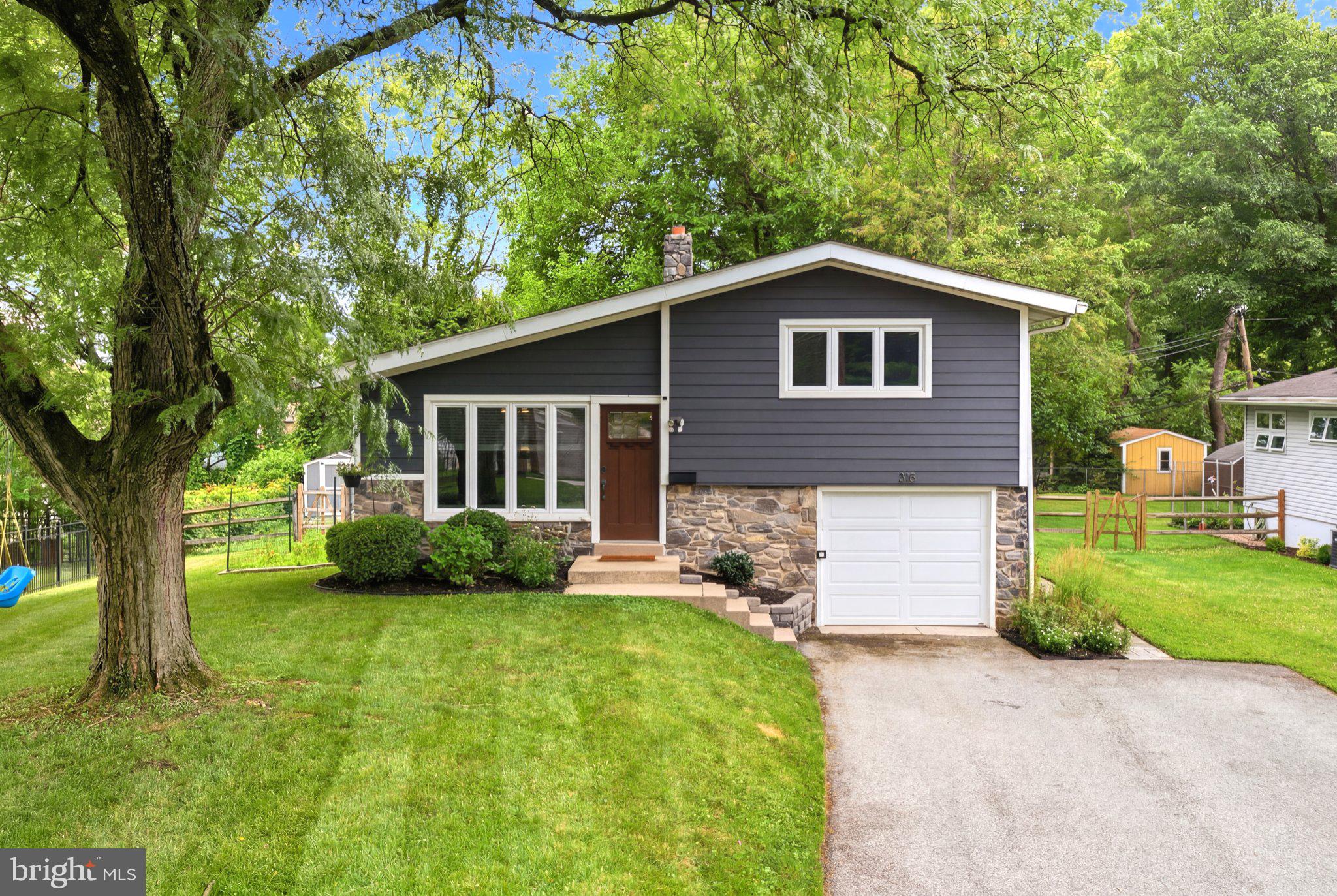 Welcome to 315 W Valley Forge Road, a beautifully maintained 3-bedroom, 2-bath split-level home ideally situated in the heart of King of Prussia. This inviting layout offers distinct living spaces across multiple levels, providing both flexibility and privacy — perfect for everyday living and entertaining alike. The main level welcomes you with a bright and open living area that flows seamlessly into the dining space, while the lower level offers additional living or recreation space, ideal for a family room, home office, or guest suite which has a slider that leads to the fully fenced in back yard. The kitchen provides ample cabinetry and counter space, and the primary suite offers a comfortable retreat with easy access to an updated bathroom. Outside, enjoy a private yard perfect for outdoor gatherings, all set on a quiet, tree-lined private backyard just minutes from major routes (76, 476, and the PA Turnpike), the King of Prussia Mall, top-rated dining, and premier shopping. With its unbeatable location and versatile split-level design, this home is a rare opportunity in one of Montgomery County's most sought-after communities. Don't miss your chance to make 315 W Valley Forge Road your next home!
