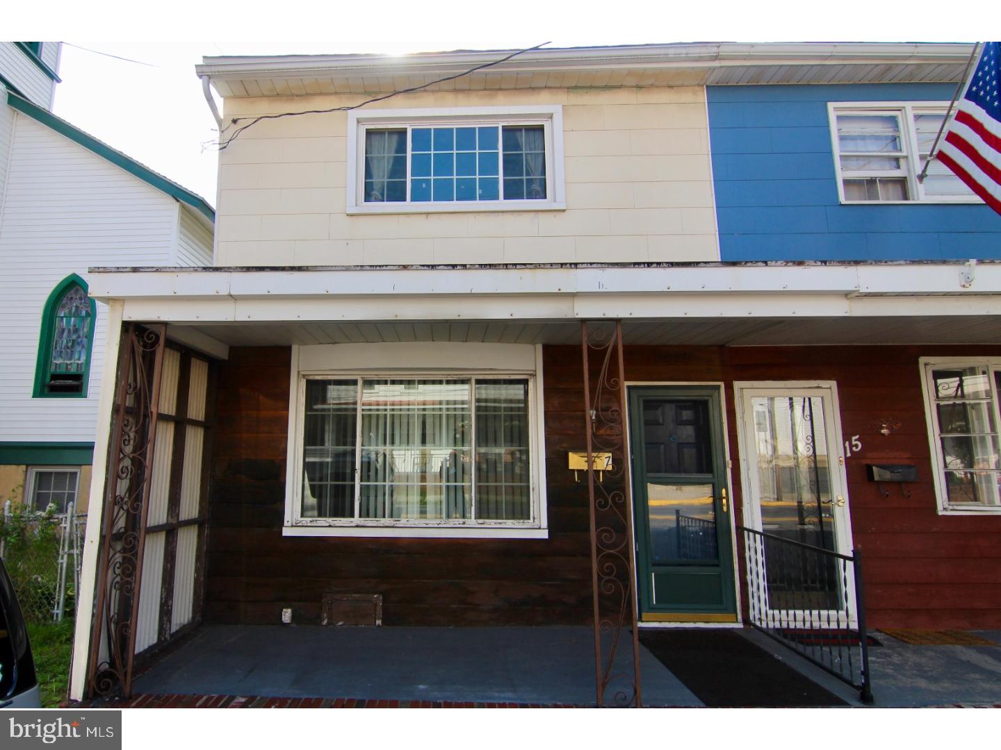 Affordable downtown location, close to shopping and schools. First floor has large combination living/dining area and eat-in kitchen with rear access to green space yard. Two nicely sized bedrooms and large bathroom on second floor; loads of closets throughout. Yard is fenced; newer roof (2008). Property is being sold "as-is", needs TLC.