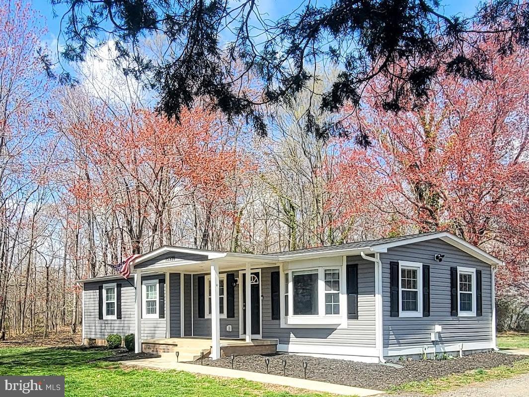 SELLER IS MOTIVATD!!!  PRICE REDUCED!!!  RAMBLER ON 6.24 ACRE LOT!  Beautiful Lot with Large Open Field, Partially Wooded/Trees, Lots of Parking, No HOA, No Covenants!!!   This beautiful Rambler has been updated over the last two years with New: Windows, Interior & Exterior Doors, Roof, Siding, Gutters, Shutters, Appliances, Master Bathroom, LVT Flooring, Recessed Lighting w/Dimmer, Custom Blinds, Back Deck, New Lights throughout, Heat Pump, Fresh Paint ***  The Living Room is Spacious with LVT Flooring, Custom Blinds/Lots of Windows, Ceiling Fan w/Light, Recessed Lighting, Bay Window * Dining Room has LVT Flooring, Recessed Lighting * Kitchen was remodeled with White Cabinets, Stainless Appliances, Recessed Lighting, LVT Flooring * Laundry Closet with Washer & Dryer plus Pantry * Utility Closet has Instant Hot Water Heater & Furnace * Three Bedrooms with Carpet & Celling Fans w/Lights which includes The Master Bedroom with a Master Bathroom which has Tile Floor, Tile Shower, Linen Closet, White Cabinets & Recessed Lighting * The Hall Bathroom has Tile Floor & Tub * Peaceful Setting * Huge Deck off the Back of House * Large Shed * Lots of Parking, Circular Driveway * Come see this Beautiful Home!!!