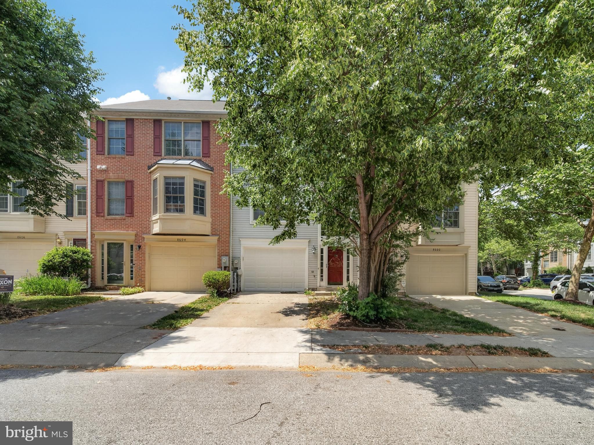 Beautiful townhome in Russett with garage converted to potential 4th bedroom, den or extra storage, third full bathroom in the basement, gourmet kitchen, 2 decks, recent upgrades to include bathrooms, flooring, stove, fully fenced yard! Move right into this adorable townhome!  Community offers walking/jogging paths, tennis, basketball courts and swimming pool! Thanks for showing!