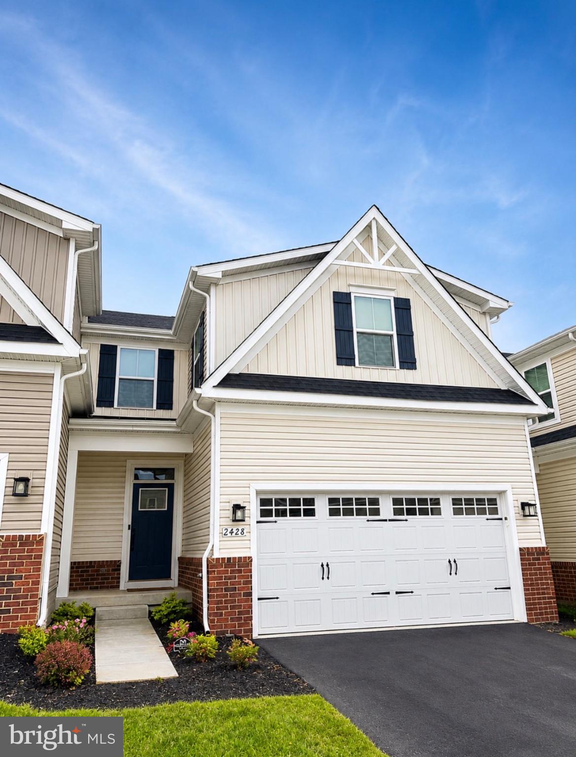 Nestled in the prestigious James Run Carriage Homes community, this exquisite townhouse offers a harmonious blend of luxury and comfort. Built in 2023, the traditional architectural style is complemented by modern amenities, creating an inviting atmosphere that feels like home. Step inside to discover an open floor plan that seamlessly connects the gourmet kitchen, featuring stainless steel appliances, a spacious island, and elegant recessed lighting, to the dining and living areas. The main level also boasts an entry-level primary bedroom/bath combo and a beautifully designed half bath, perfect for guests. Upstairs, boast 2 generous bedrooms and a den/office/gym and a full bath. The almost fully finished basement offers additional living space, with a walkout entrance that leads to a serene backyard, backing to lush trees for added privacy. Enjoy outdoor living on the charming porch, or take advantage of the community amenities, including a clubhouse, pickleball courts, and scenic walking paths. With a two-car attached garage and energy-efficient appliances, this home is designed for modern living. Experience the tranquility of wooded views while being part of a vibrant community. This property is not just a home; it's a lifestyle waiting to be embraced.