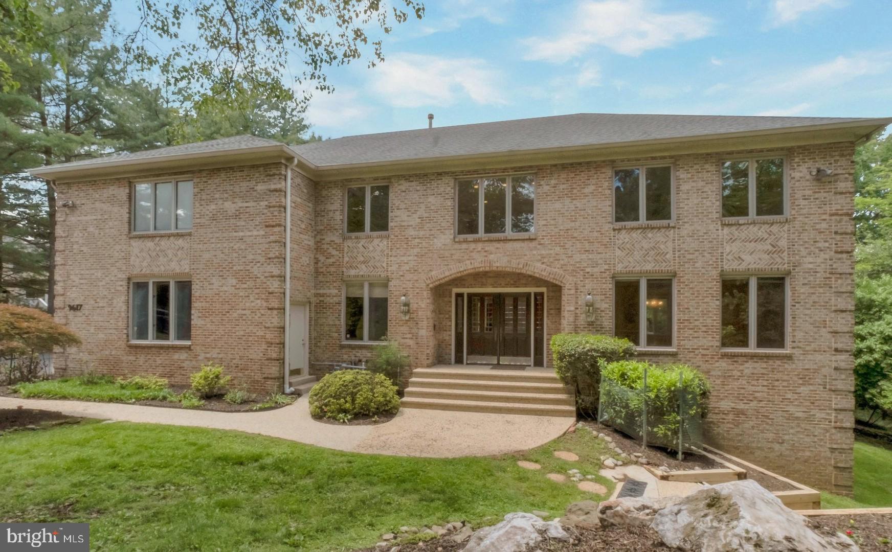 Extraordinary custom designed Stately ALL BRICK colonial in desirable Bedfordshire nestles on 0.84 acre of secluded oasis premium lot.  Over 7,000 square feet of living space, this residence boasts exceptional blend of elegance and comfort across all three levels. Step inside to see the expansive floor plan featuring stunning grand two story foyer with marble floor, oak staircase. Spacious and inviting living room and dinning room with recessed lights and  a general sized office with custom built-in bookcase, all with stylish hardwood floor. Continue around into gorgeous gourmet kitchen with recently upgraded stainless appliances,  designer island with commercial grade range hood, pantry with built-in shelving, and custom cabinetry and exquisite tiled floor.  A breakfast nook with wall of windows and sliding door to the deck.  Adjacent family room with floor to ceiling stone fireplace, large windows and another sliding door leading to huge deck with magnificent view of patio, pool, and professional landscaping.  The laundry area and mudroom with custom built-in shelves.

The upper level features a huge luxury primary suite with tray ceiling, two walk-in closets with custom built-in, dual vanities with granite counter and jacuzzi tub and separate shower stall.  Adjacent room can be either a sitting room or bedroom. Three additional well proportioned bedrooms with one  private bath and a Jack & Jill bath. Hardwood floor throughout entire top level. Fully finished walkout lower level has a wet bar, a glass sliding door to backyard, and two additional bedrooms with windows, and a full bath.  This house has well designed driveway with circle garden center,  side load garage, and ample parking space. 

The entire interior is freshly painted. Two of three HVAC systems were updated in 2020. Water heater, 2022.  All stainless appliances were replaced in 2022-2024, except the trash compactor and sink water heater are new . Chimney and front path way were rebuilt in 2022. Deck is rebuilt in 2019 and also freshly painted.  Most of windows and sliding doors were replaced in 2015.  The powder room is newly renovated.

Very convenient commuting with Ride-on bus down the street and easy access to I-270 and I-495. Close to  Potomac Village and Cabin John shopping center.