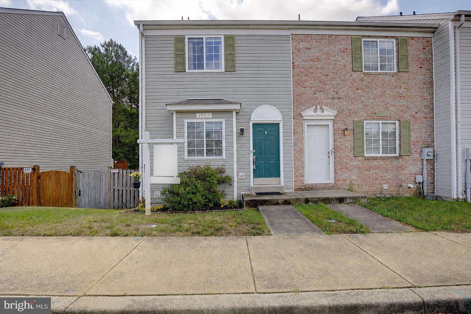 Welcome home to this beautifully maintained end-unit townhome in the sought-after Hickory Hills community of Great Mills! Offering three finished levels of living space, this charming Colonial-style home combines comfort, convenience, and value.

Inside, you'll find a bright and inviting layout featuring a spacious living area, cozy fireplace with glass doors, and an updated kitchen complete with gas cooking, stainless appliances, and plenty of room to prepare your favorite meals. With 2 bedrooms and 2 full bathrooms, this home offers flexible living spaces designed for today's lifestyle.

The fully finished walkout basement expands your living area and provides endless possibilities for a recreation room, home office, fitness space, or guest retreat. Step outside to enjoy your private deck, perfect for morning coffee, grilling with friends, or simply relaxing after a long day.

As an end-unit, you'll appreciate the added privacy and natural light. Residents of Hickory Hills enjoy access to a community pool, trash service, and a convenient location close to shopping, dining, schools, entertainment, and Patuxent River Naval Air Station.

Whether you're a first-time buyer, downsizing, or looking for an excellent investment opportunity, this move-in ready home is one you won't want to miss!