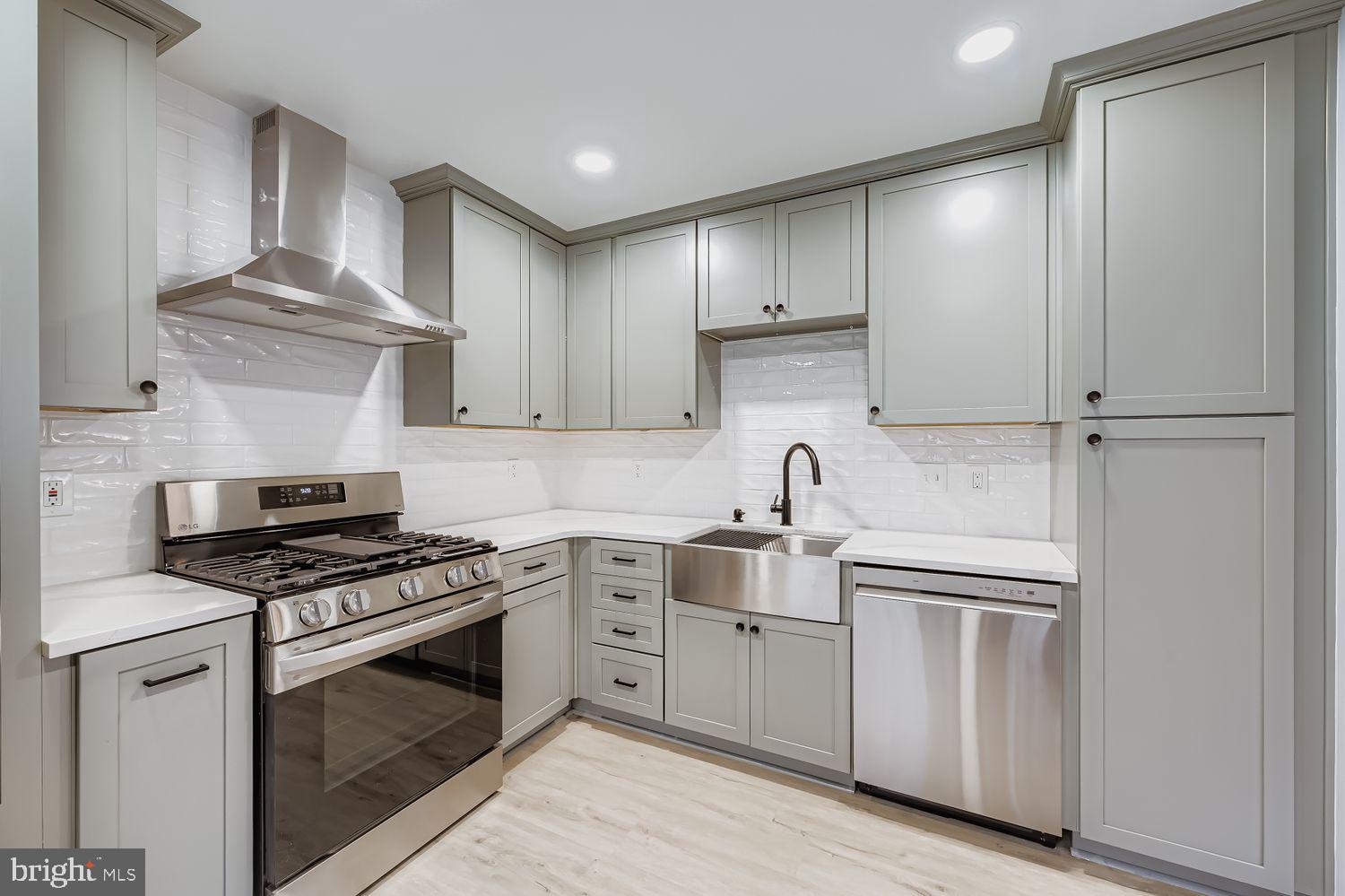 Welcome to 5114 Wagon Shed Circle, a first-floor condo designed for simple and comfortable living. This two-bedroom, two-bathroom home offers an open layout thoughtfully updated throughout. New luxury vinyl plank flooring and fresh paint run throughout the entire space, creating a clean, cohesive feel. 

The kitchen underwent a full renovation in 2023 and now features soft-close cabinetry, quartz countertops, a farmhouse-style sink, a new garbage disposal, updated lighting, and a complete set of new stainless steel appliances, including a refrigerator, gas stove with stainless steel vent hood, and dishwasher. The result is a modern, practical, and inviting space ready for everyday cooking and entertaining.

This home is nearly maintenance-free with major systems already taken care of. A new HVAC system was installed in 2023, a new water heater was added in June 2025, and the washer and dryer were also newly updated. Three brand-new ceiling fans with multiple speeds and dimming remote controls add comfort and convenience. Additionally, every interior door has been upgraded with new black-finished hardware.

A private patio extends the living area outdoors and offers a peaceful place to relax.

The primary bedroom includes double closets and an en-suite bathroom with a new toilet. The second bedroom, brightened by a large bay window, has access to a full bathroom with a new toilet and a jack-and-jill door connecting to the hallway.

The community takes care of daily upkeep, including lawn care, snow removal, and exterior maintenance. Do not worry about trash collection or water bills; the community takes care of them, too. 

Residents also enjoy amenities such as a swimming pool, tennis courts, playgrounds, a party room, and a community center. Shopping, dining, and commuter routes are all close by, making daily life easy and convenient.

Conventional or cash buyers will appreciate this move-in-ready home in a desirable Owings Mills location.