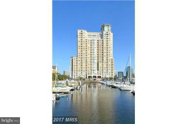 Dramatic & architecturally reconfigured Penthouse w/unparalleled soaring views of Inner Harbor to north & Key Bridge to south from 90 ft of glass windows.Features:open floor plan,LR w/ gas fpl.,custom gourmet kitchen,sumptuous en-suite master Br/Ba, en-suite guest Br., striking finishes,3 covered balconies, 2 pkg spaces & storage. Option to lease w/designer furnishings. Great bldg. amenities!