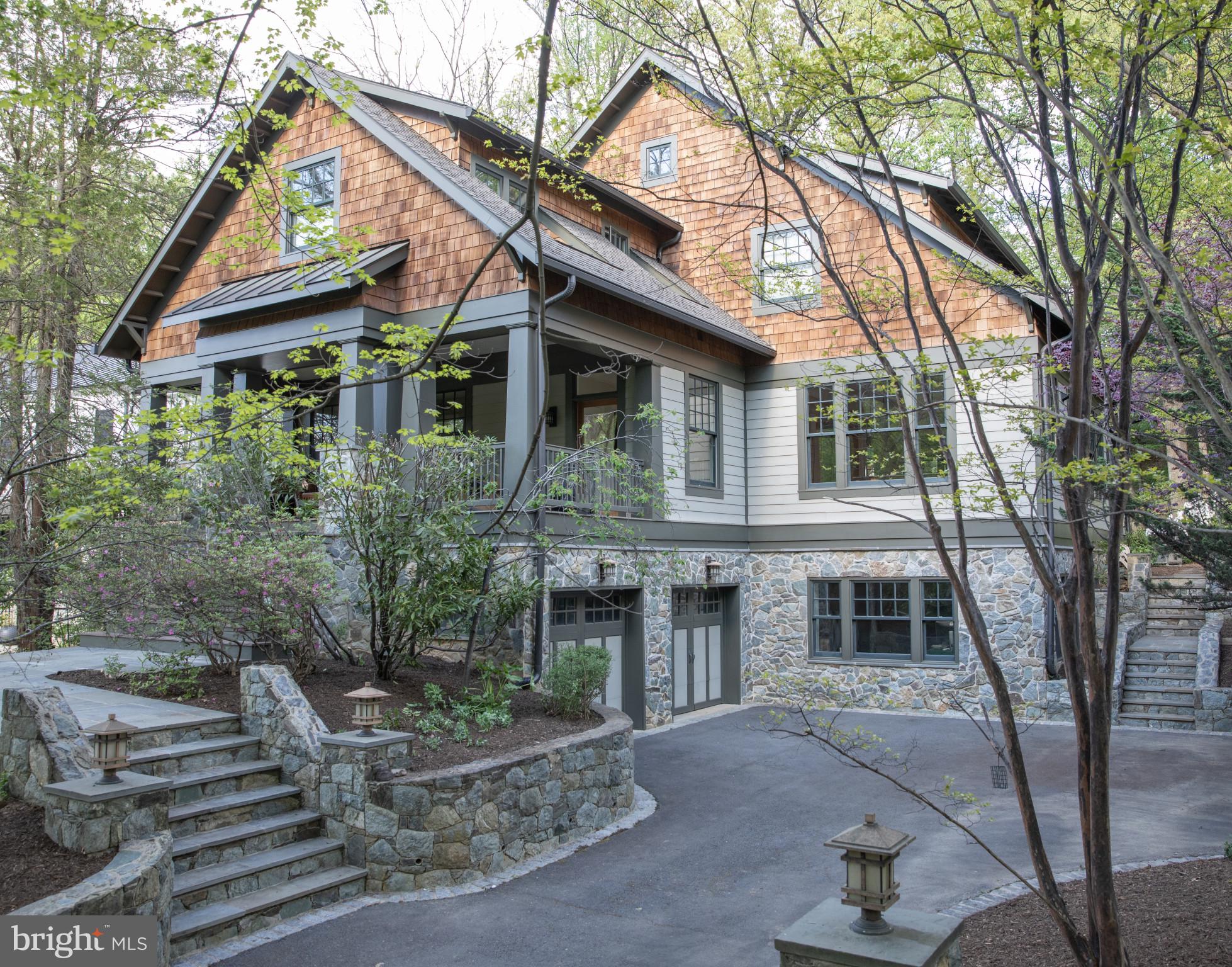 Gorgeous Craftsman-inspired Morris-Day home available in highly sought-after Franklin Forest/Franklin Park. Designed as a new build by locally acclaimed architects Rob Morris and Dwight McNeil to meet the owners’ twin desires for family living and bringing the outdoors in, every detail has been thoughtfully planned from the banks of windows on every side of the house to custom toy closets. The heart of this three-level home is the south-west facing gourmet kitchen with eat-in island, two sinks, two dishwashers, and Wolf/SubZero/Bosch appliances. Twin sets of French doors in the dining room swing open to invite al fresco dining in the screened-in back porch. Enjoy uninterrupted views of mature trees in the fully wooded lot as you sit by the stone wood-burning fireplace in the family room. A lovely columned living room leads to a large private office with built-in desk, bookshelves, and filing cabinets.

Upstairs features the 14’ cathedral ceiling master bedroom with walk-in closet and oversized limestone master shower, two large bedrooms with Jack and Jill bathroom, guest room with ensuite bathroom, and laundry room with sink and wall of wood cabinets. The sunlit recreation room with built-in entertainment center and surround sound speakers is the star of the walk out level side of the basement with large southern and western windows. A spacious fifth bedroom (currently used as an exercise room) with large windows on the daylight basement side, full bathroom, mudroom, and utility/storage room complete this level.

Bespoke finishes typical in Morris-Day homes include extensive moulding and wainscoating, built-ins, pin and art lights. Oak flooring, 7’ solid wood doors, and high ceilings (ground - 9’; main - 10'; upstairs - 8 1/2’) were specified throughout all three levels. First floor stereo system extends into the screened-in porch. Inspired by the natural beauty of its surroundings, the home features 59 double-pane, over-sized Marvin windows. A 29' covered front porch with treetop views and the 17’ screened-in porch both feature Trex flooring and create an additional 478 sq feet of living space. The Carderock back patio, stairs, footpaths, and stone walls were designed by Gardenwise Landscaping.

One of the few lots with no neighbor behind it, the property extends from Franklin Avenue to Virginia Avenue.