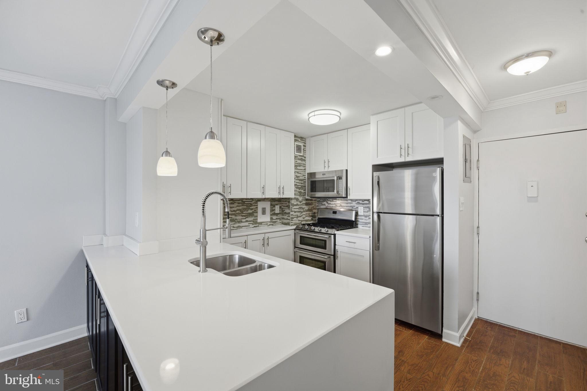 High-Rise Living with Resort-Style Amenities!
Welcome to this beautifully renovated 1-bedroom, 1-bath condominium offering comfort, convenience, and beautiful views from the 8th floor. Thoughtfully updated throughout, this home showcases tasteful finishes and modern touches that create a warm, inviting atmosphere.

The renovated kitchen features updated cabinetry, newer appliances, attractive flooring, and a functional layout designed for everyday living. The spacious living area and bedroom boast beautiful wood flooring, while the luxurious bathroom has been stylishly updated with quality finishes that add a touch of elegance. Updated lighting and abundant natural light make every room feel bright and welcoming.

Enjoy a low-maintenance lifestyle with an impressive array of building amenities:

 24-Hour Concierge & Front Desk Service, Updated Fitness Center with Sauna, Outdoor Swimming Pool, Tennis Courts Ample Parking, Secure Building Access, Utilities are included in the condo fee!
Ideally located just minutes from the White Flint Metro, shopping, dining, entertainment, and major commuter routes, this home offers exceptional convenience for work and play.
This  move-in-ready condo delivers outstanding value, comfort, and location.
Minutes to Metro,  shopping, dining, and commuter routes.
Schedule a tour today!