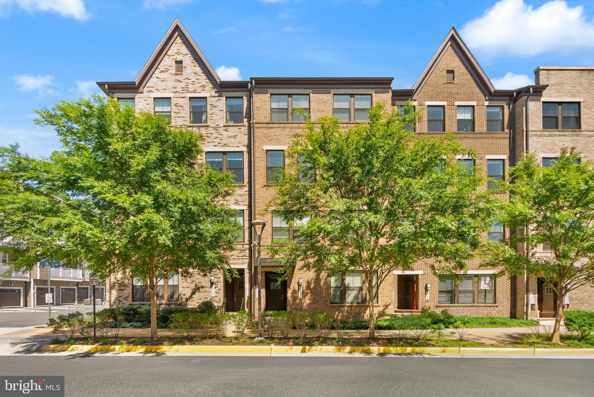 Welcome to the vibrant Kincora Community, where modern living meets convenience! This stunning three-level townhouse/condo is a perfect blend of comfort and style, featuring three spacious bedrooms and two and a half beautifully designed bathrooms.

As you enter, you're greeted by an inviting atmosphere and easy access to the garage. Ascend the carpeted stairs to discover the heart of this exquisite home. The second level boasts rich, luxury vinyl plank flooring that flows effortlessly throughout. The gourmet kitchen is a chef's paradise, equipped with sleek stainless steel appliances, magnificent granite countertops, and a central island with beautiful pendant lighting that inspires creativity and connection. Abundant natural light, complemented by warm recessed lighting, enhances the welcoming ambiance.

Picture cozy evenings in the family room, where an electric fireplace casts a soothing glow, creating the ideal setting for relaxation. The expansive living room is designed for entertaining, offering an open, airy space perfect for memorable movie nights with family and friends.

On the upper level, you will find a luxurious retreat featuring a primary bedroom adorned with elegant tray ceilings and a generous walk-in closet. The main bathroom serves as a tranquil oasis with dual vanities, ideal for unwinding after a long day, while two additional cozy bedrooms offer comfort and style. Conveniently, the laundry is also located on this level. The home also has custom blinds throughout. 

This home's prime location within the thriving Kincora community is truly exciting, with significant development and innovation on the rise. Look forward to the upcoming Northern Virginia Science Center, an interactive destination that promises to ignite curiosity and learning right in Kincora. Enjoy the proximity to the Dulles Technology Corridor, a hub of growth, and embrace the fun that PINSTACK will bring, set to open within Kincora for endless entertainment.

Just minutes away, One Loudoun and Dulles Town Center offer a rich array of dining, shopping, and entertainment options to enhance your lifestyle. With effortless access to major routes, including Route 7, Route 28, and the Dulles Greenway, as well as nearby Dulles International Airport, convenience is at your fingertips.

This townhouse/condo is more than just a home; it's your gateway to a move-in-ready lifestyle, ideally positioned for your future. Seize the opportunities that await in this spectacular home!