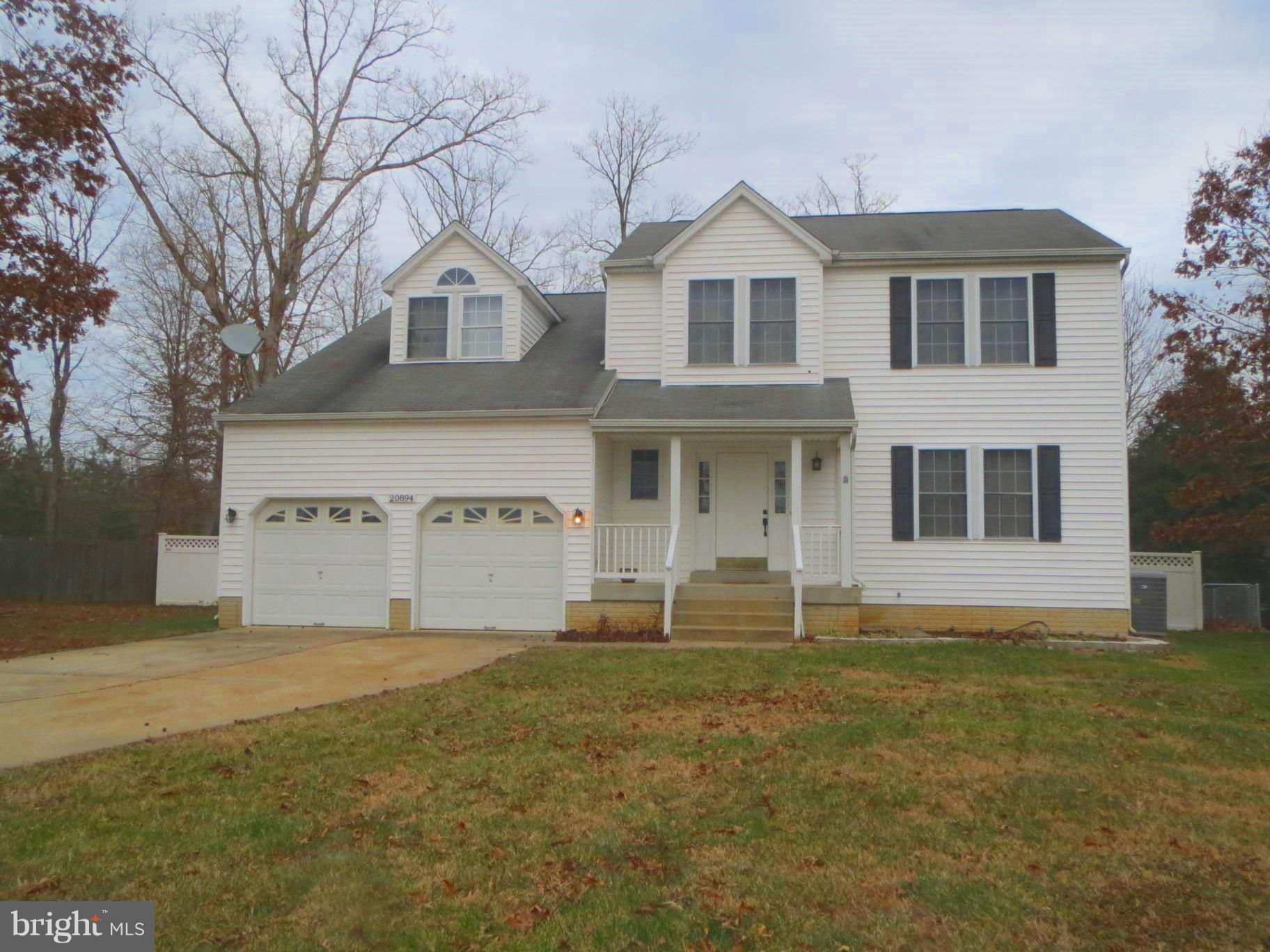 Beautifully maintained colonial conveniently located. . Enjoy this spacious open floor plan with lots of room for the whole family. Gleaming hardwood floors throughout & Freshly painted. Master bedroom suite w/ vaulted ceiling , master bath w/ soaking tub and sep shower. Fully finished basement complete w/ rec room and full bath. Oversized 2 car garage. Expansive deck with fenced level backyard