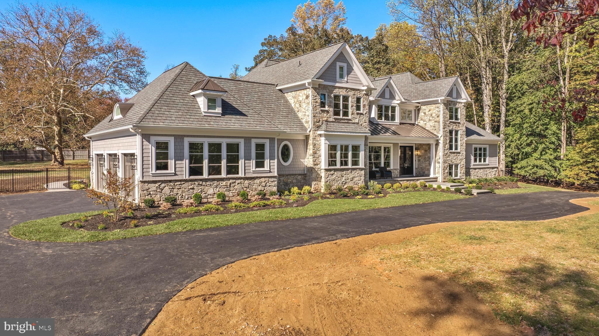 Everything you have ever wished for both inside and out. 
Simply too many things to be said about this home, including the craftsmanship, floor plan, gracious spaces, property and location.
As you drive through the serene  Greenspring Valley Hunt Club Golf Course, your oasis  awaits ...complete with top notch new construction living with ideal indoor and outdoor entertaining, you will see no detail is missed.
Outside, you will find  a  heated saltwater pool with spa, bubblers, tanning ledge, gas heater and automatic cover and  even a gas fire-pit along with ample patio and hardscape and gas firepit.  You can even enjoy the covered porch with fireplace and built-in grilling .....you will find yourself never wanting to leave.
Impeccable attention to detail and the highest level of finish are found in this turn key brand newly constructed home. 
With a fist floor primary suite and additional second floor primary suite, all bases are covered for lifestyle and multi-generational living.  
This home boasts a magnificent chef's kitchen and pantry, along with 1st floor laundry and second floor laundry/hobby room, .... additionally, you will find a sun drenched office, wine room, theater, gym, bar and elevator. 
Truly too many features to mention. 
Be the lucky one to live the lifestyle you have always dreamed of.